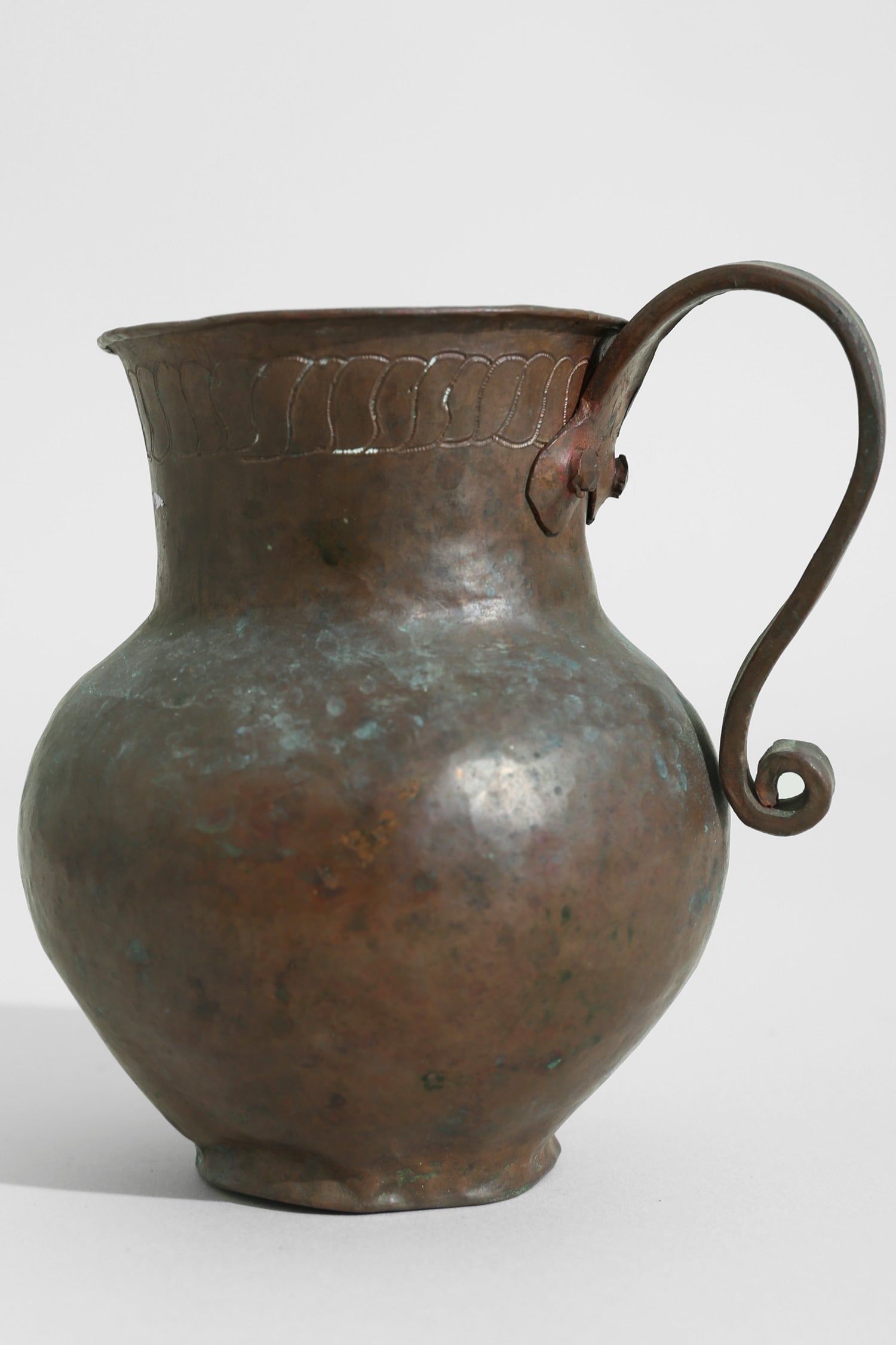 Copper Folk Pitcher — lifestyle setting