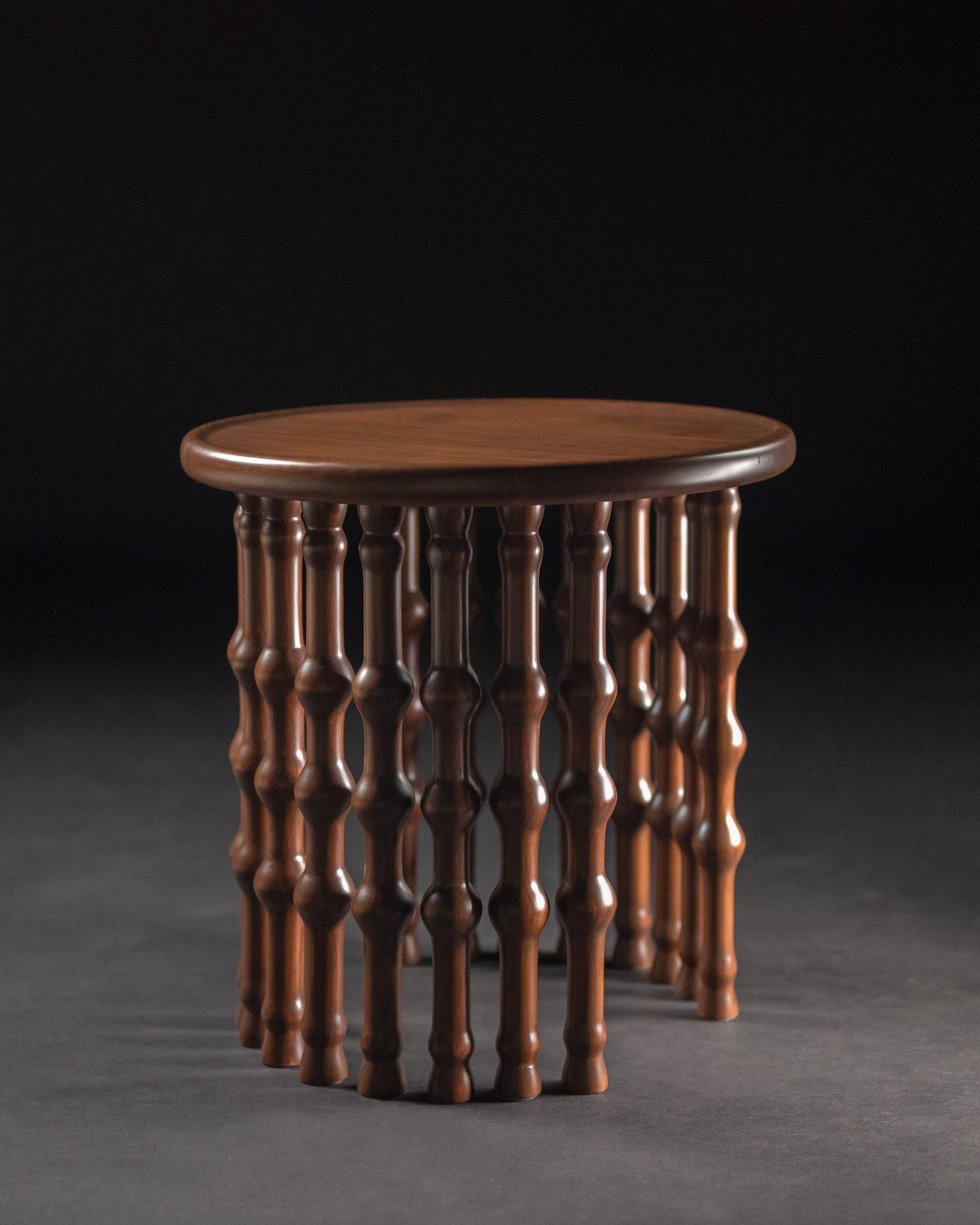 Arcus Side Table — close-up of handcrafted wooden legs