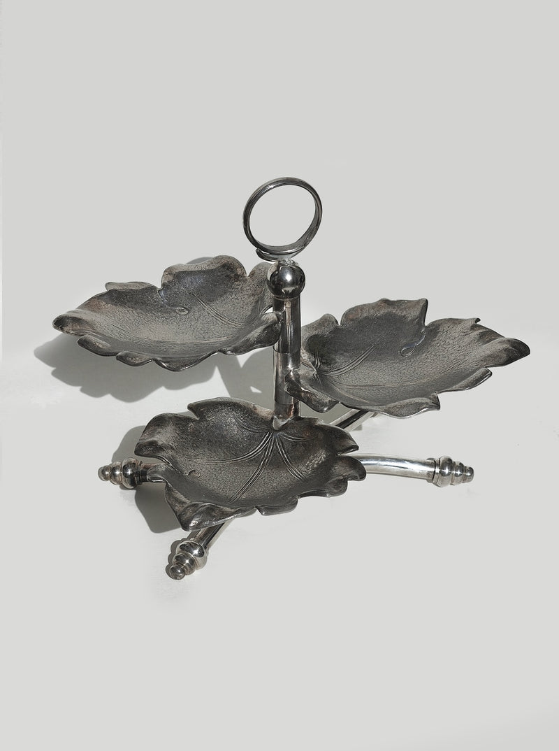 Triple leaf server tray with chrome center handle and ornate dishes
