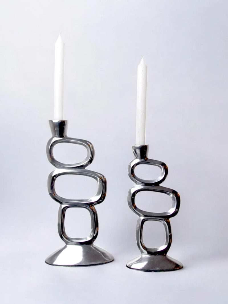 Pair of Candleholders by Matthew Hilton, 1980 by Malamar Studio | The Oblist — polished metal finish