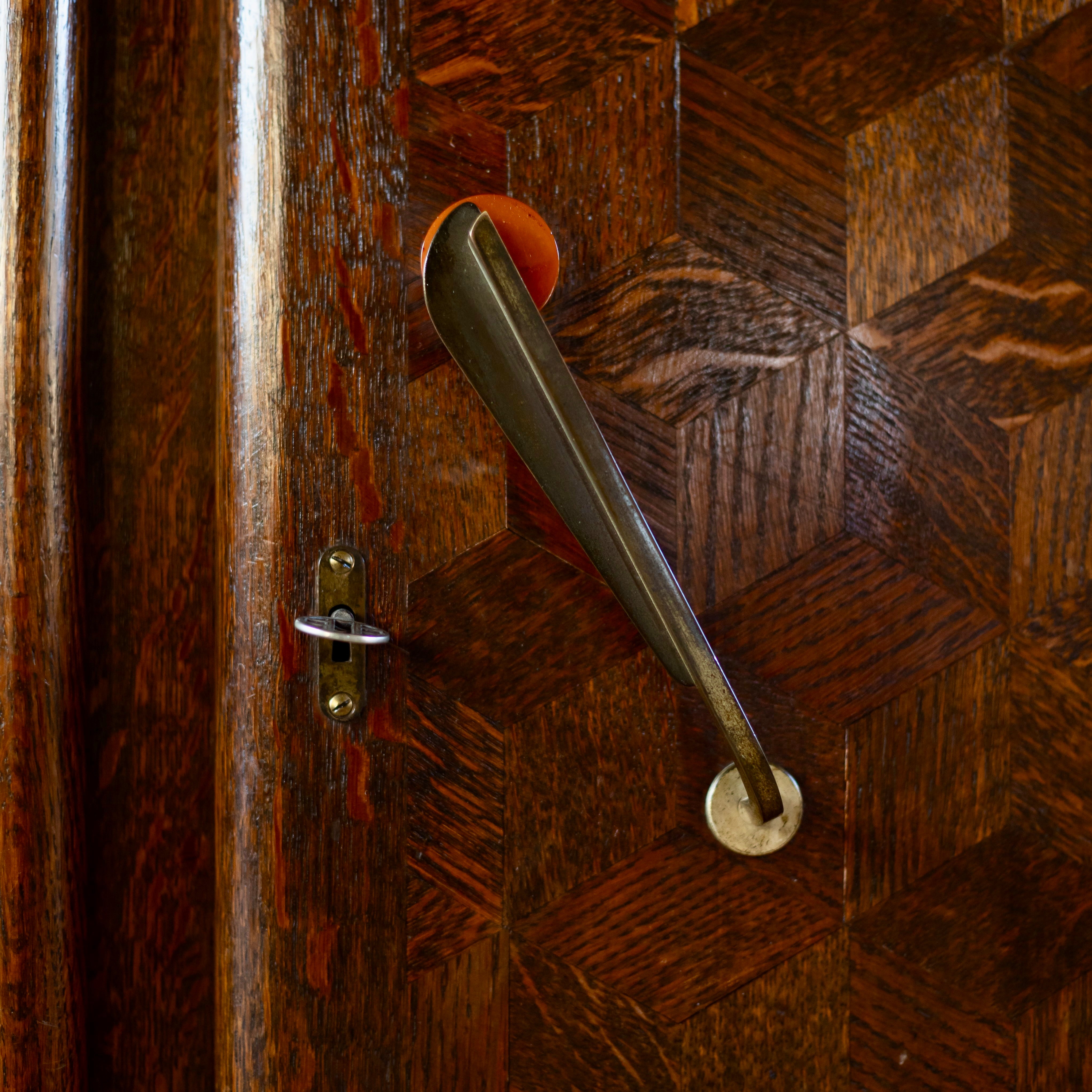 Pair of Art Deco Belgian Parquetry Cabinets with Rose Marble Tops — close-up of parquetry detail and brass handle