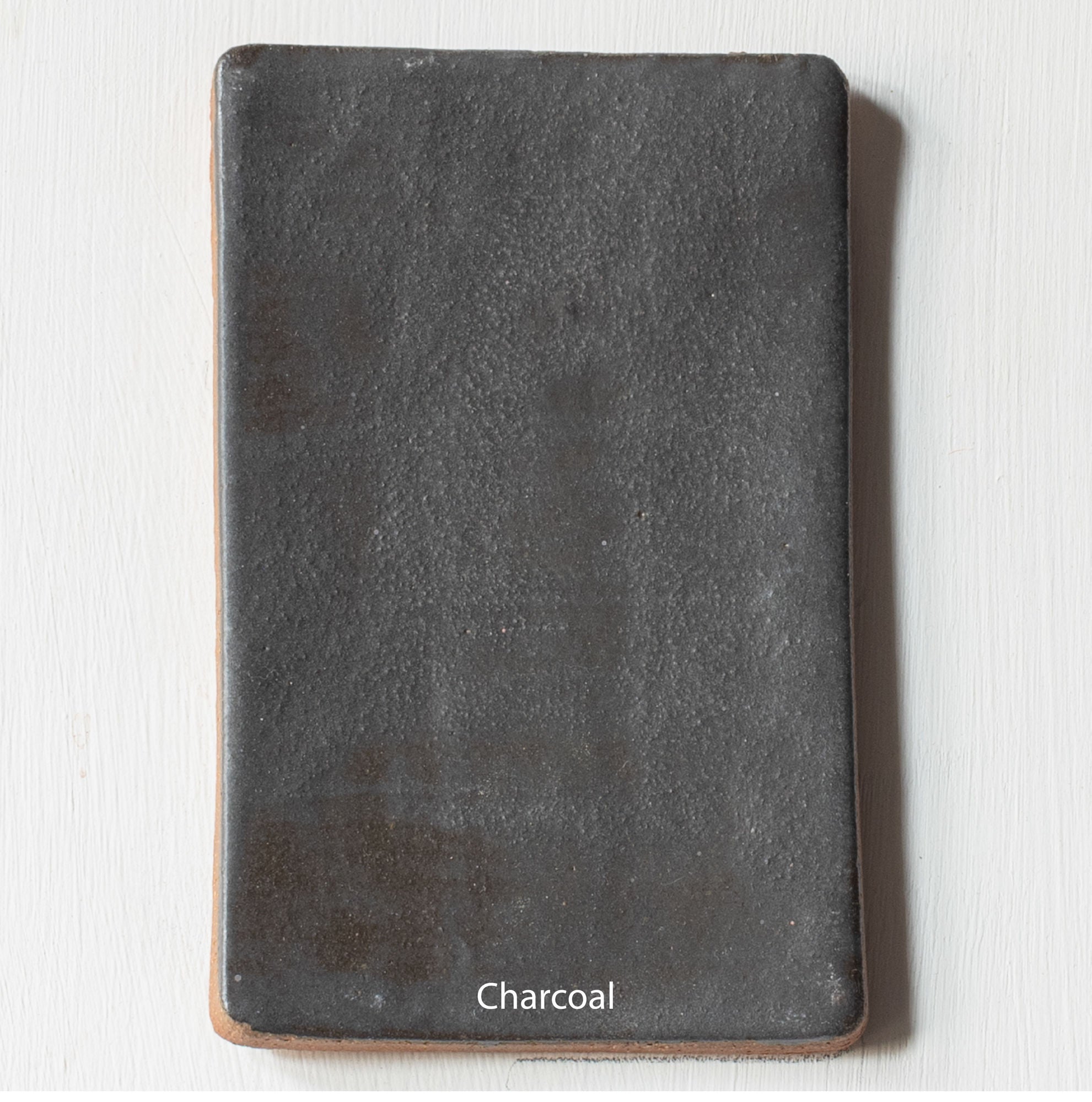 Silo' Table Lamp 1 — close-up of charcoal textured surface