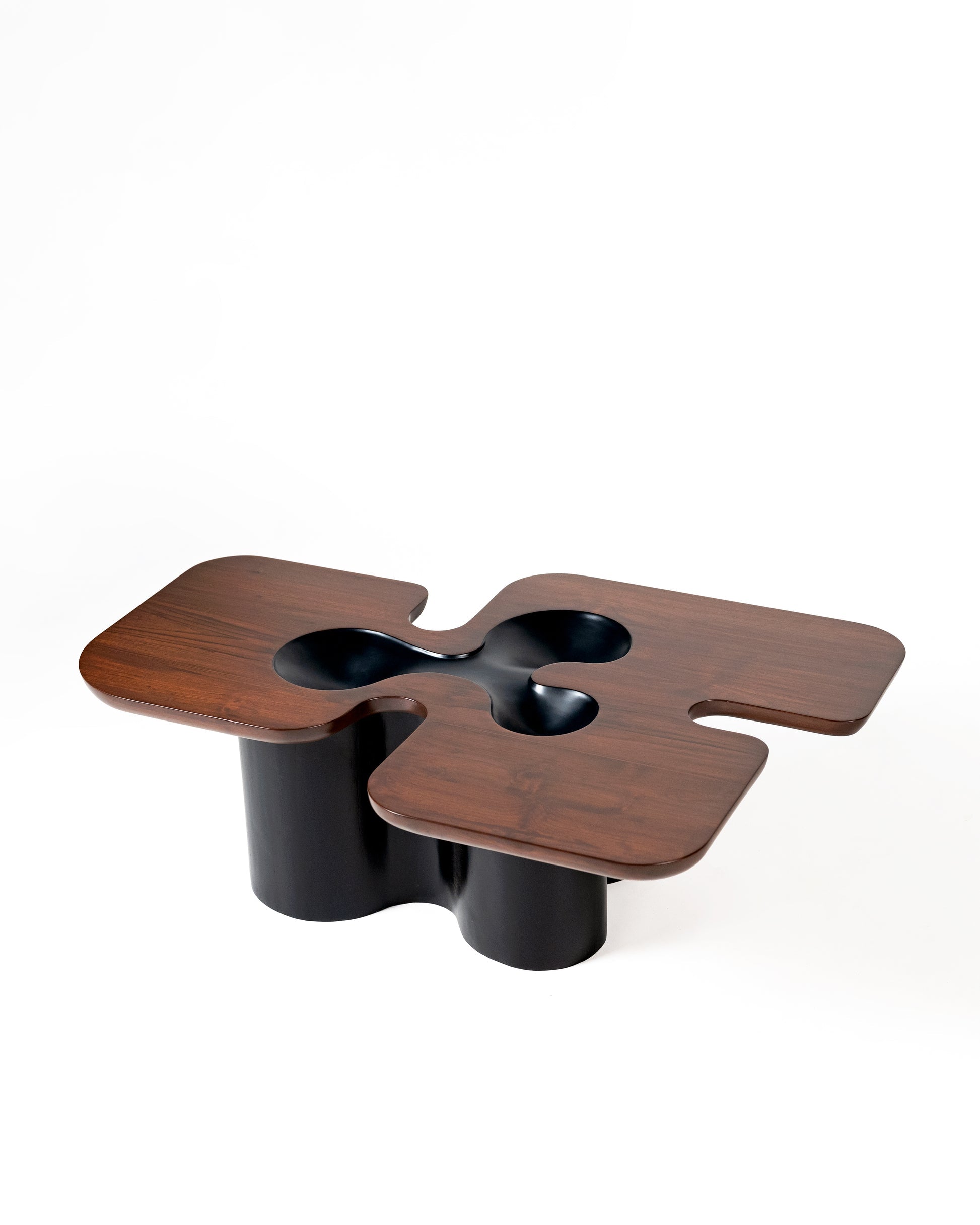 Canyon Centre Table — angled view highlighting walnut top and black base