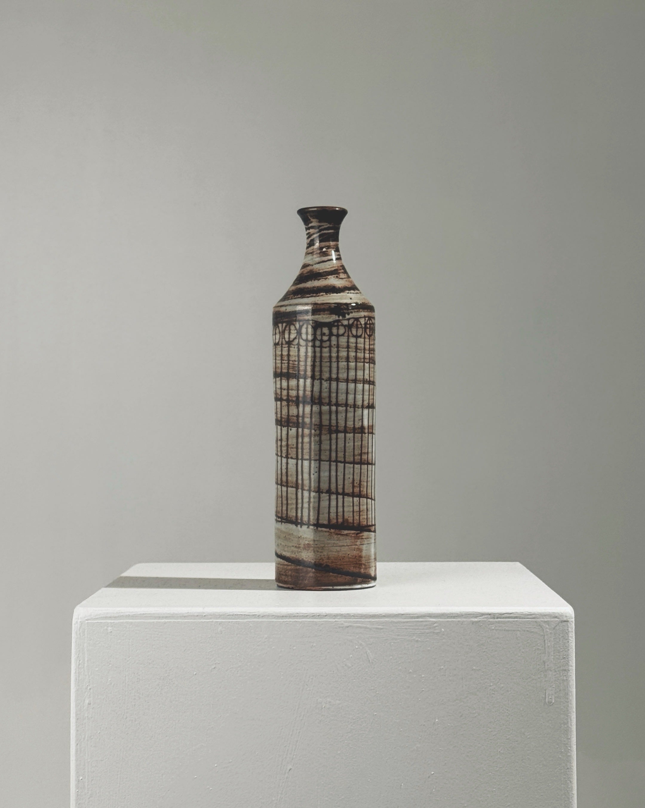 Ceramic soliflore vase by Jacques Pouchain with geometric grid pattern
