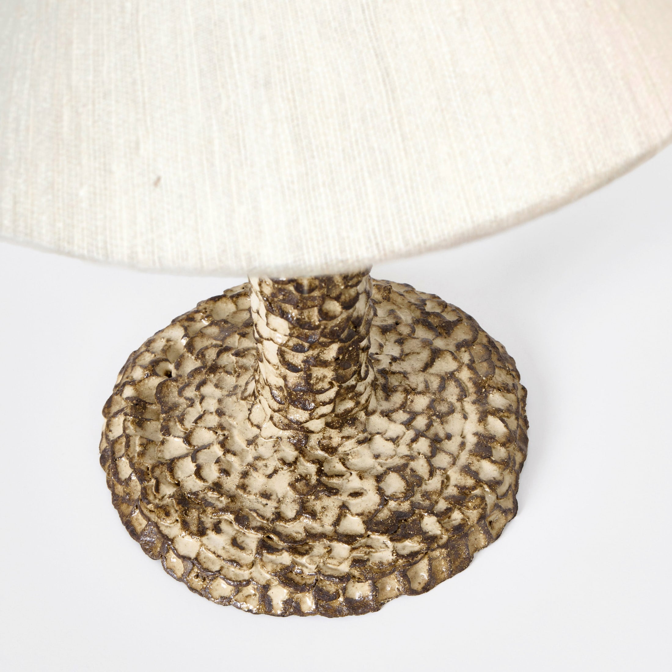 Casa Bedside Light — close-up of textured base in neutral tones
