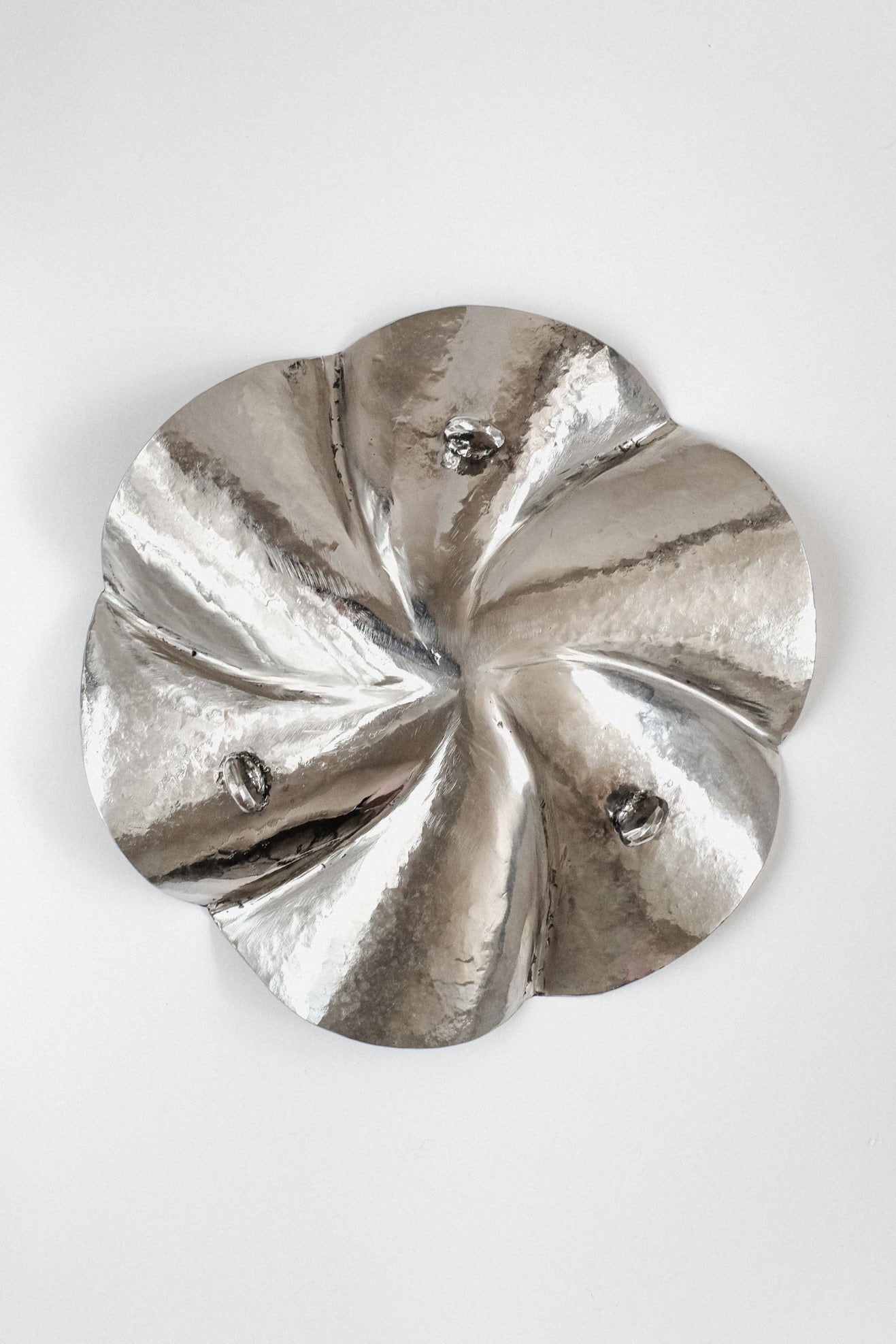 Decorative Footed Bowl — top view of hammered silver surface