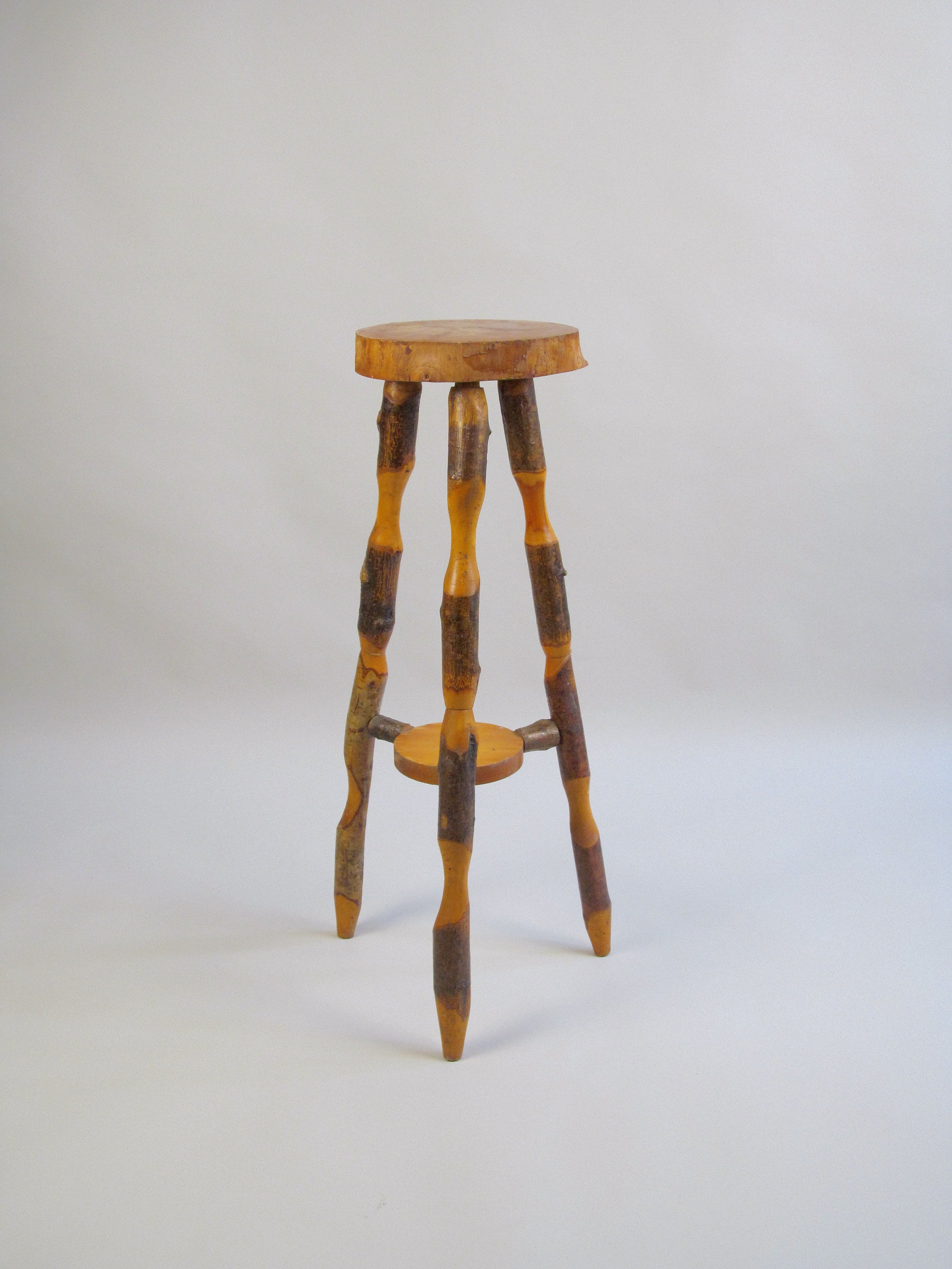 Naturalistic Wooden End Table — close-up of handcrafted wooden legs