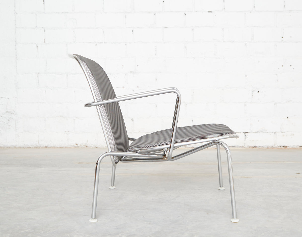 Two "Web Chairs" by Antonio Citterio for B&B Italia — lifestyle setting