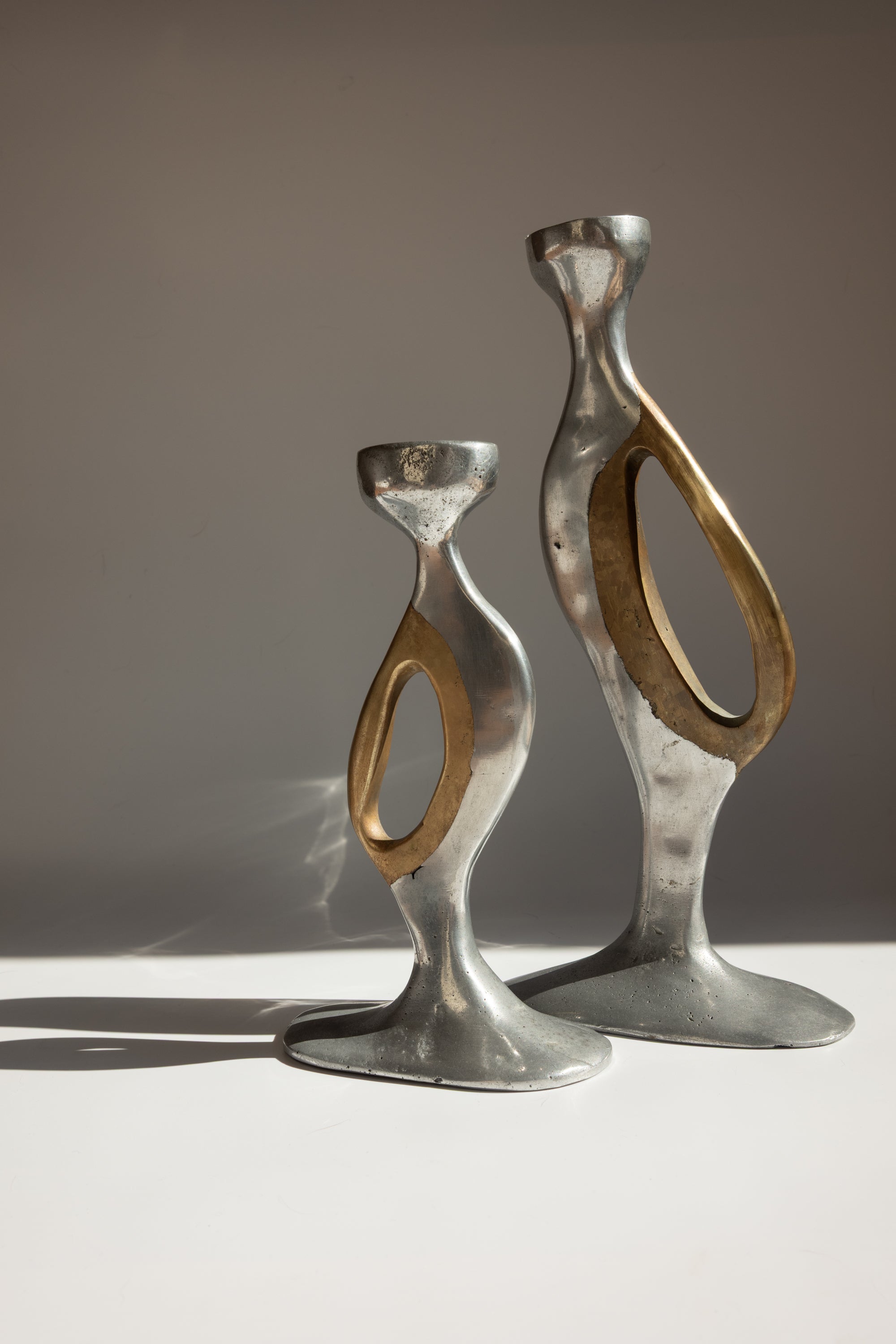 Brutalist Aluminium and Brass Candlesticks by Léopold - Spain, c. 1970s by Trove Paris | The Oblist