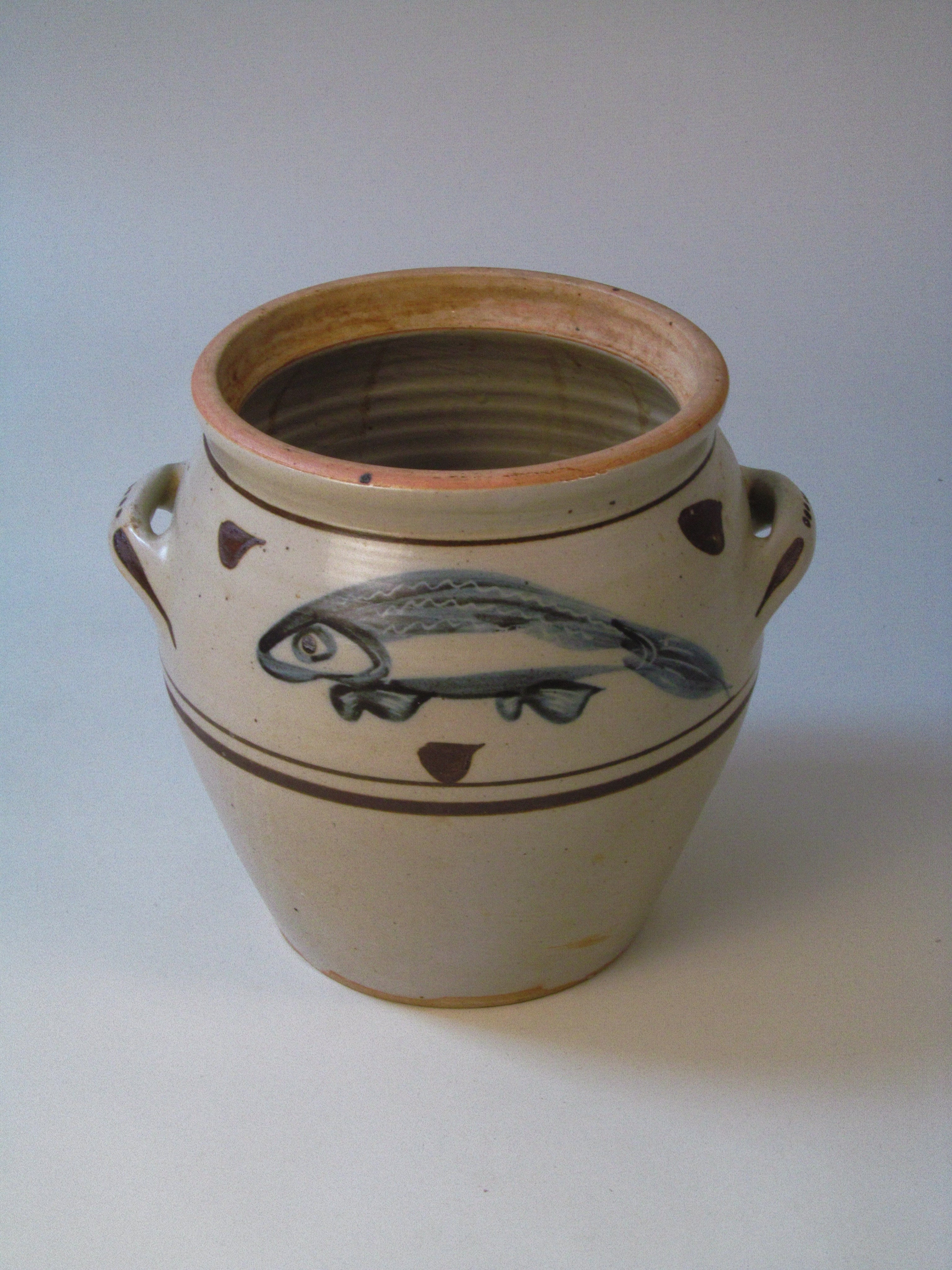 Large Slip-Decorated Stoneware Jar with Fish Motif — side angle showing ceramic material and fish design