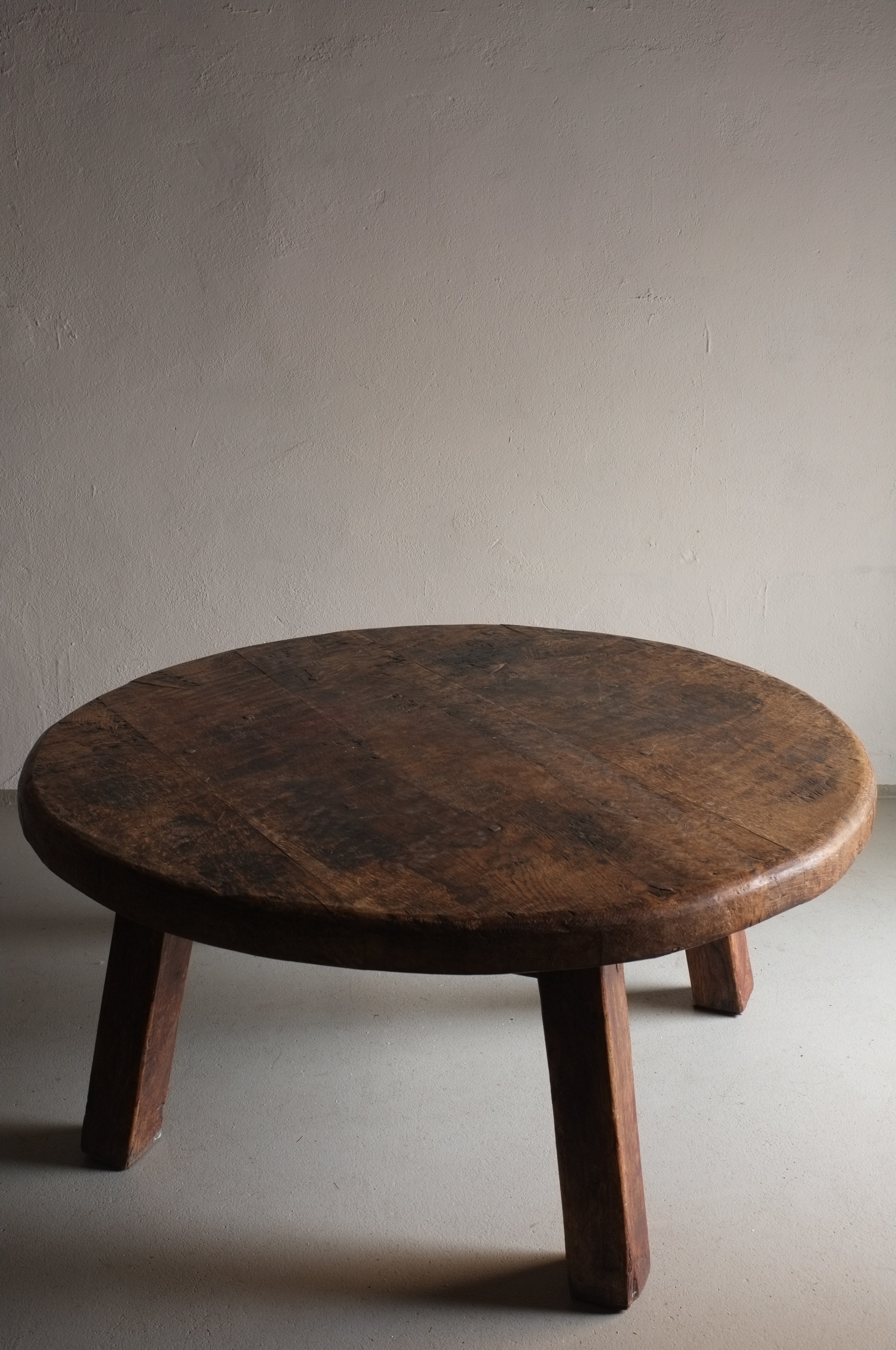 Brutalist Oak Round Coffee Table | Belgium | 1950s — back view highlighting wooden texture and legs