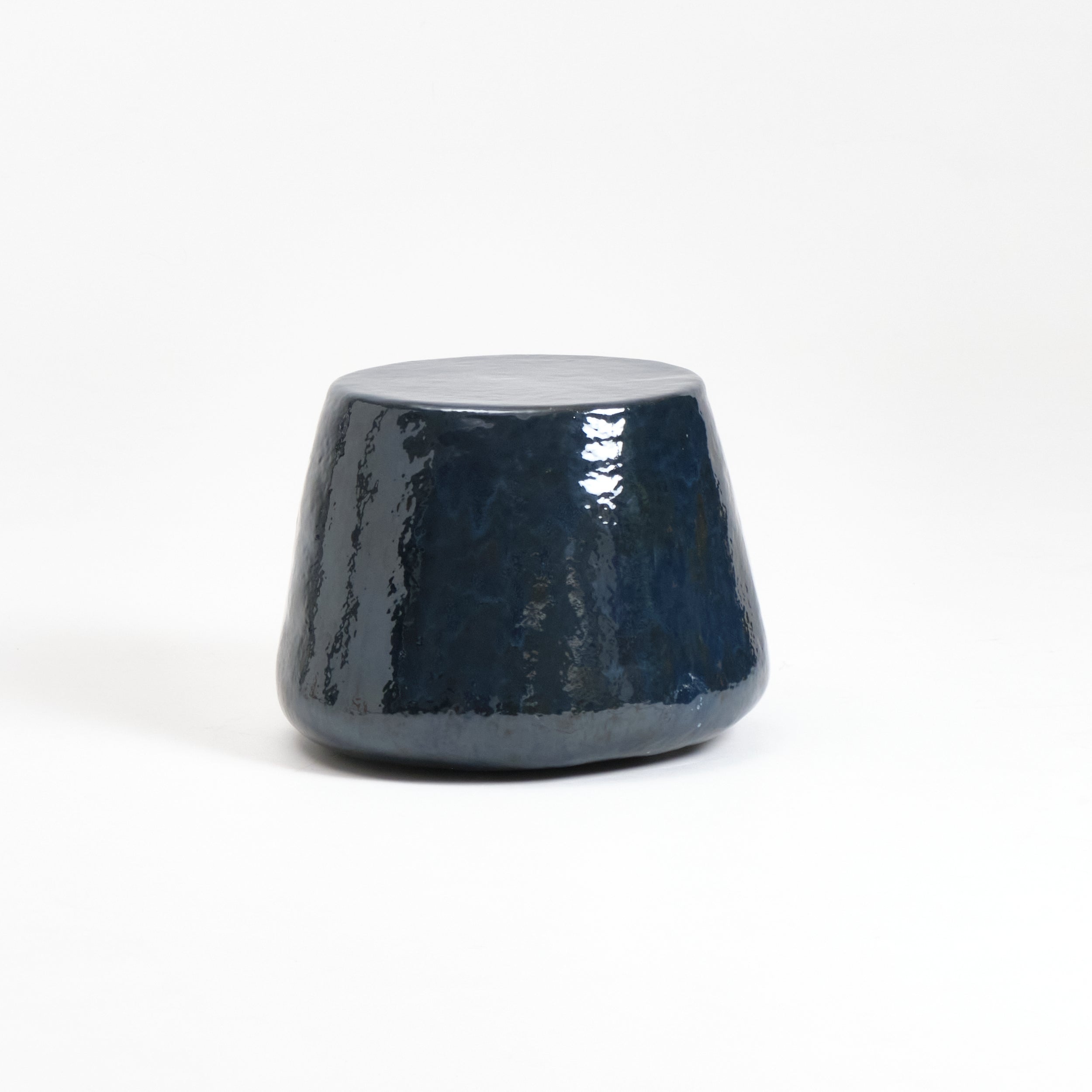 Medium Ceramic Side Table — back view of glossy navy finish