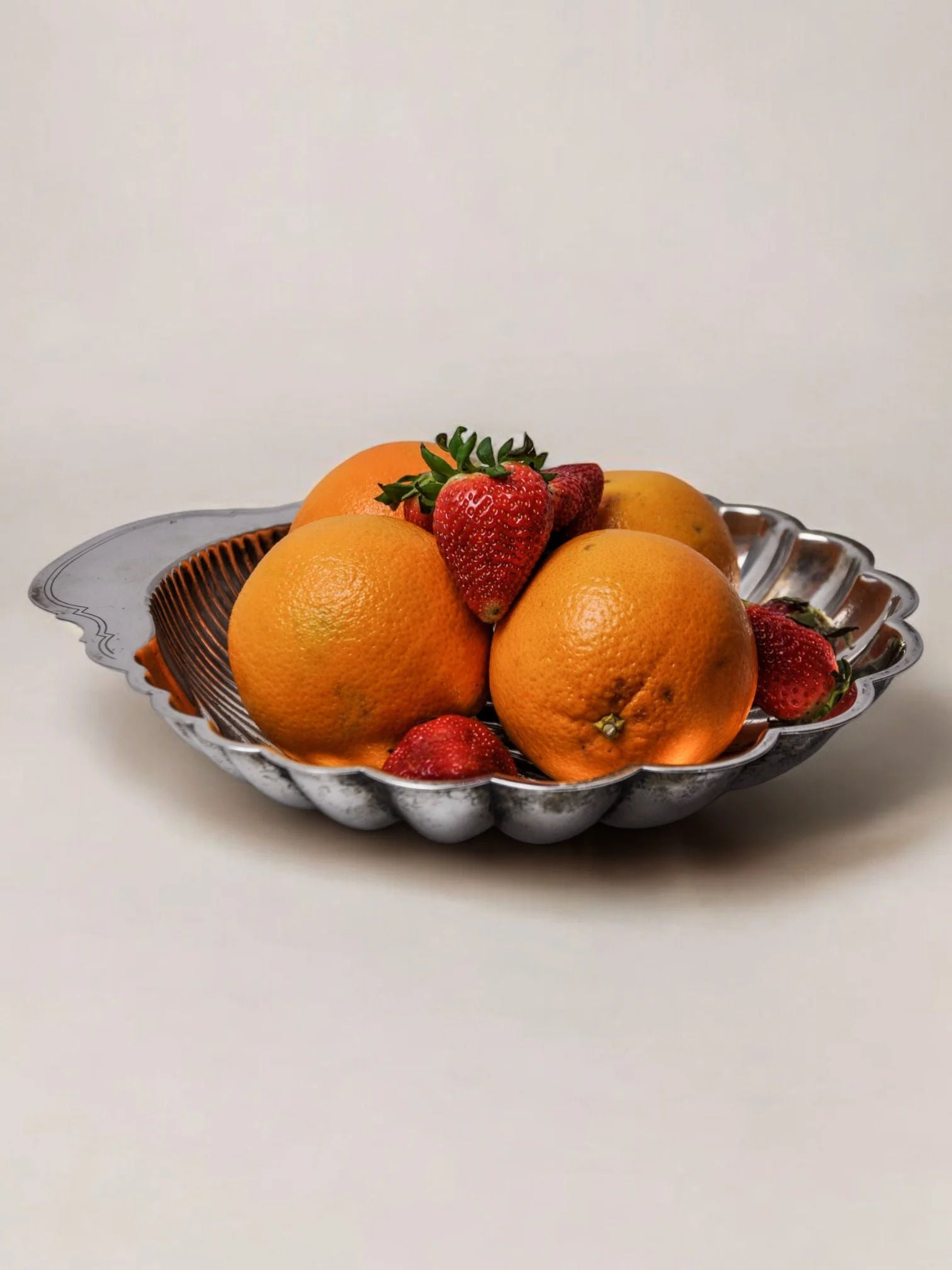 Silver Plated Shell Vide-poches 1970 — side angle with fruit arrangement