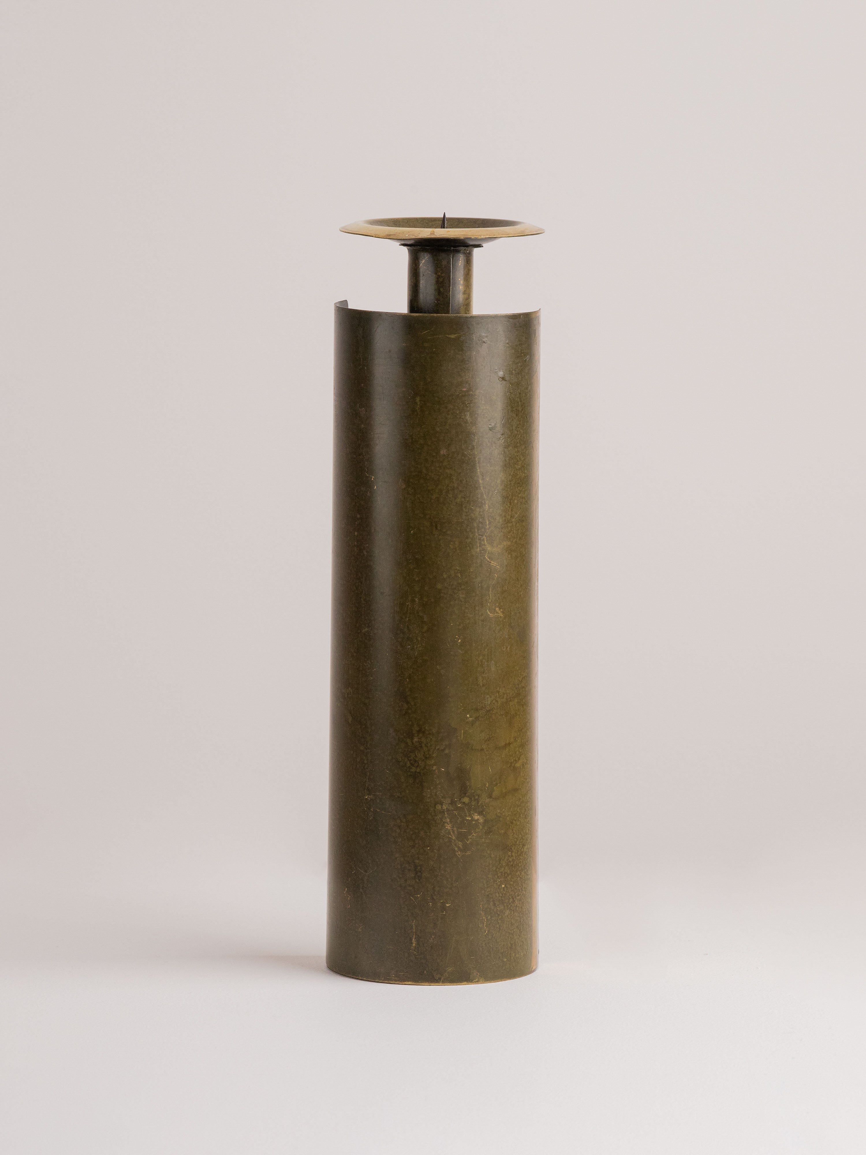 Brutalist Metal Candle Holder- Czesław Palczewski, 1970s Mid Century Modern — side angle highlighting cylindrical bronze desi