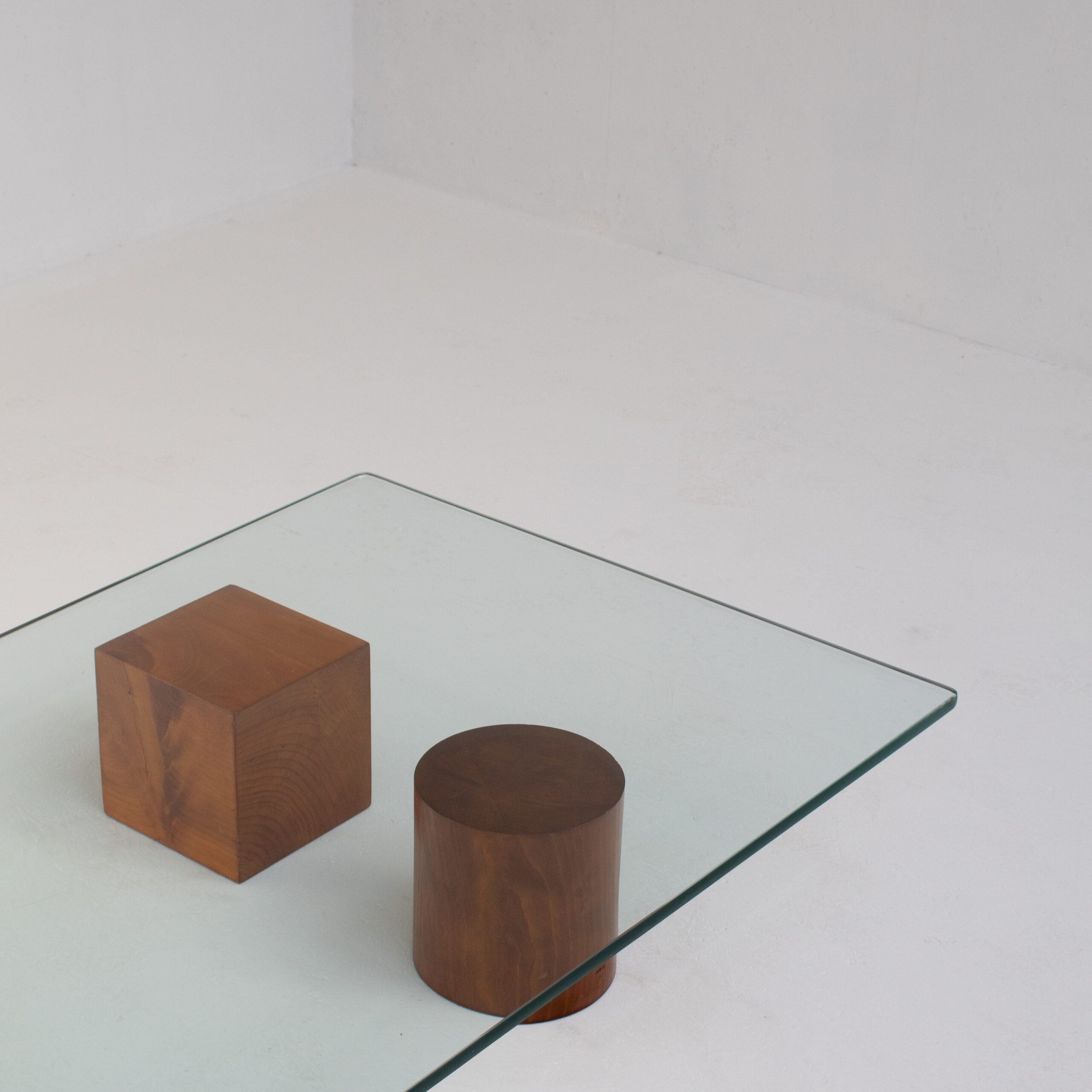 Vintage Coffee Table in Wood and Glass — top view with wooden blocks on glass