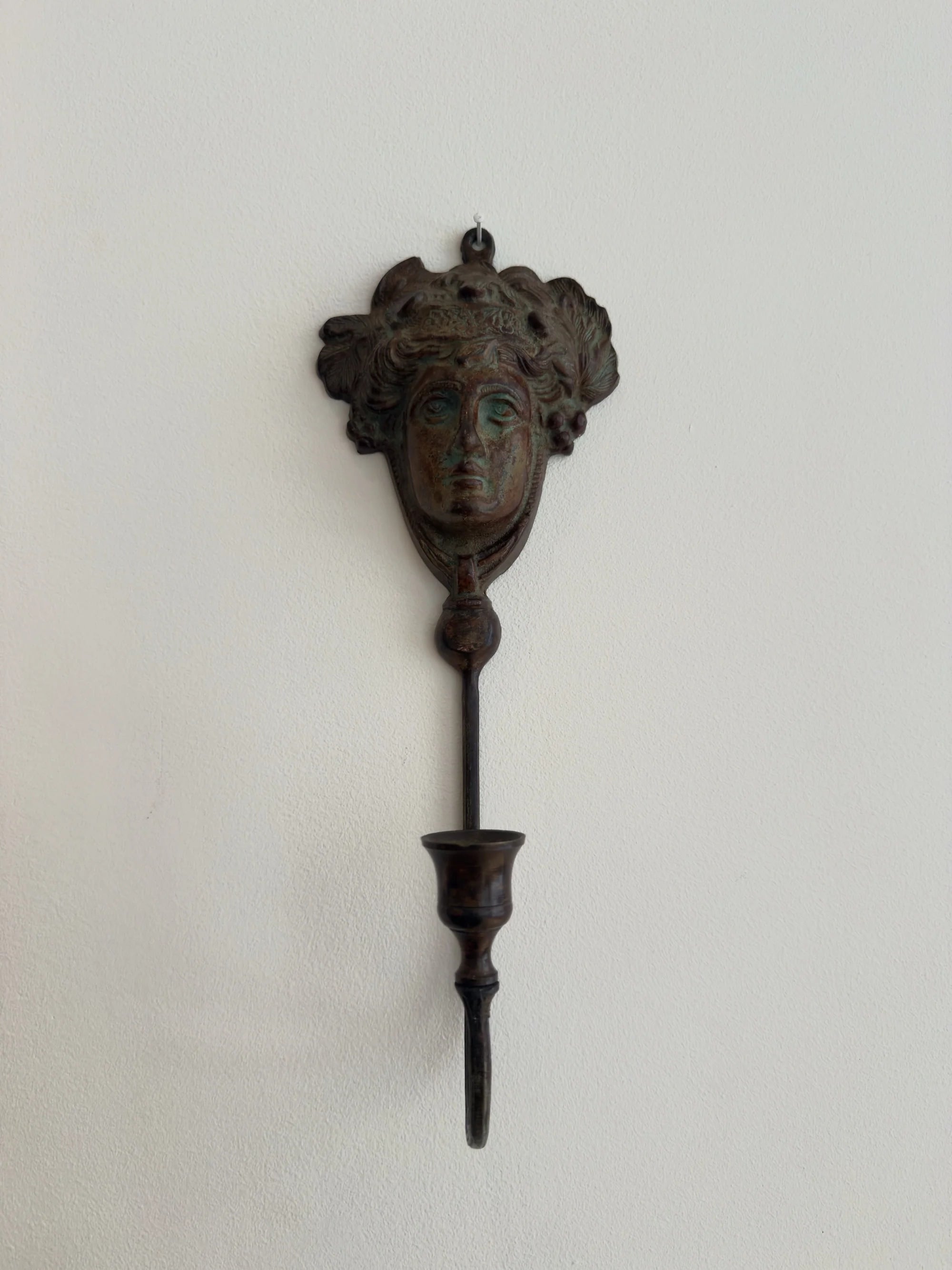 Neoclassical Bronze Candle Sconce — close-up of face detail and holder