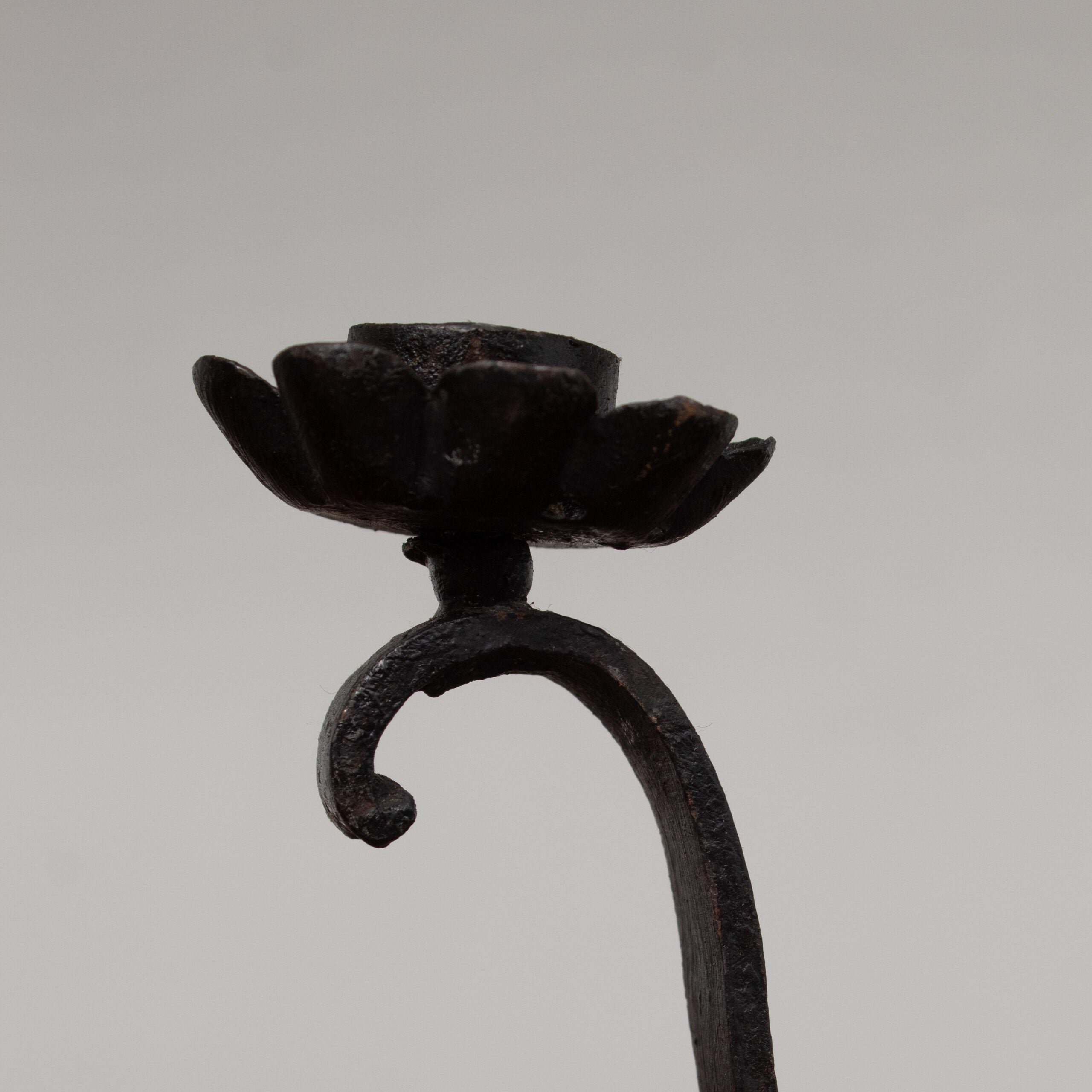 Pair of Brutalist Iron Candleholders with Sculptural Scroll Arms — close-up