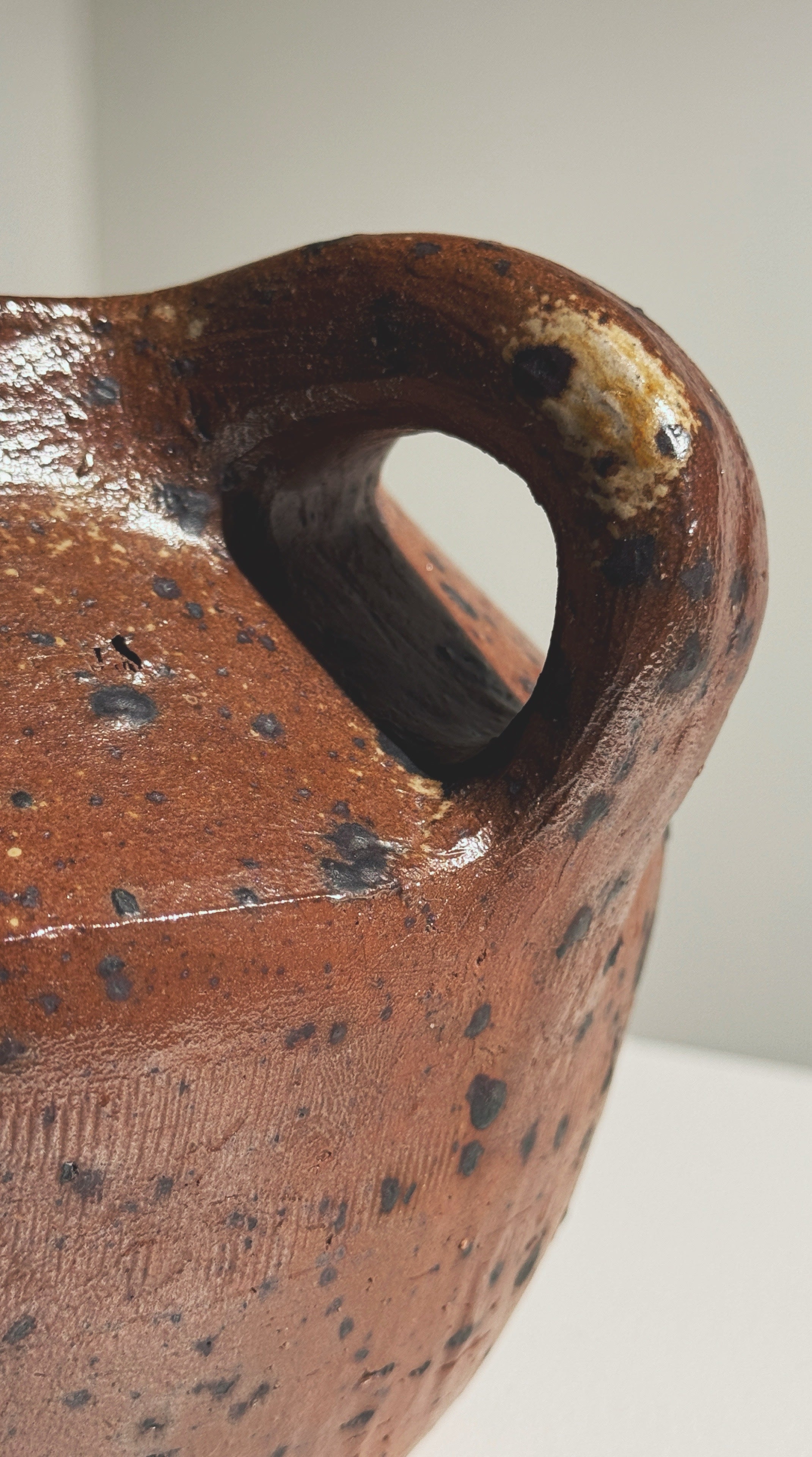 Close-up of spout and handle detail on Pierre Digan stoneware pitcher
