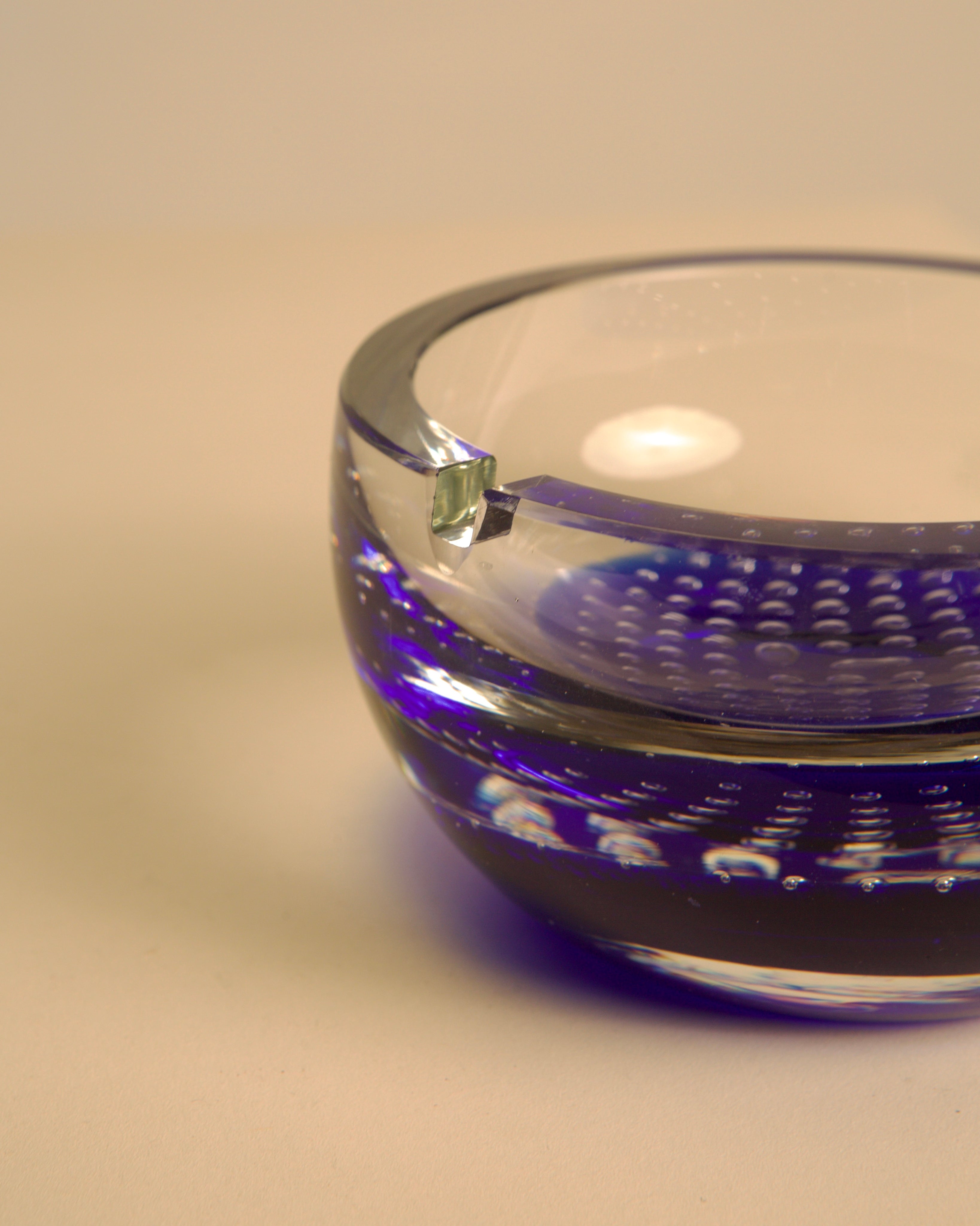 Purple Murano glass ashtray detail showing textured interior design