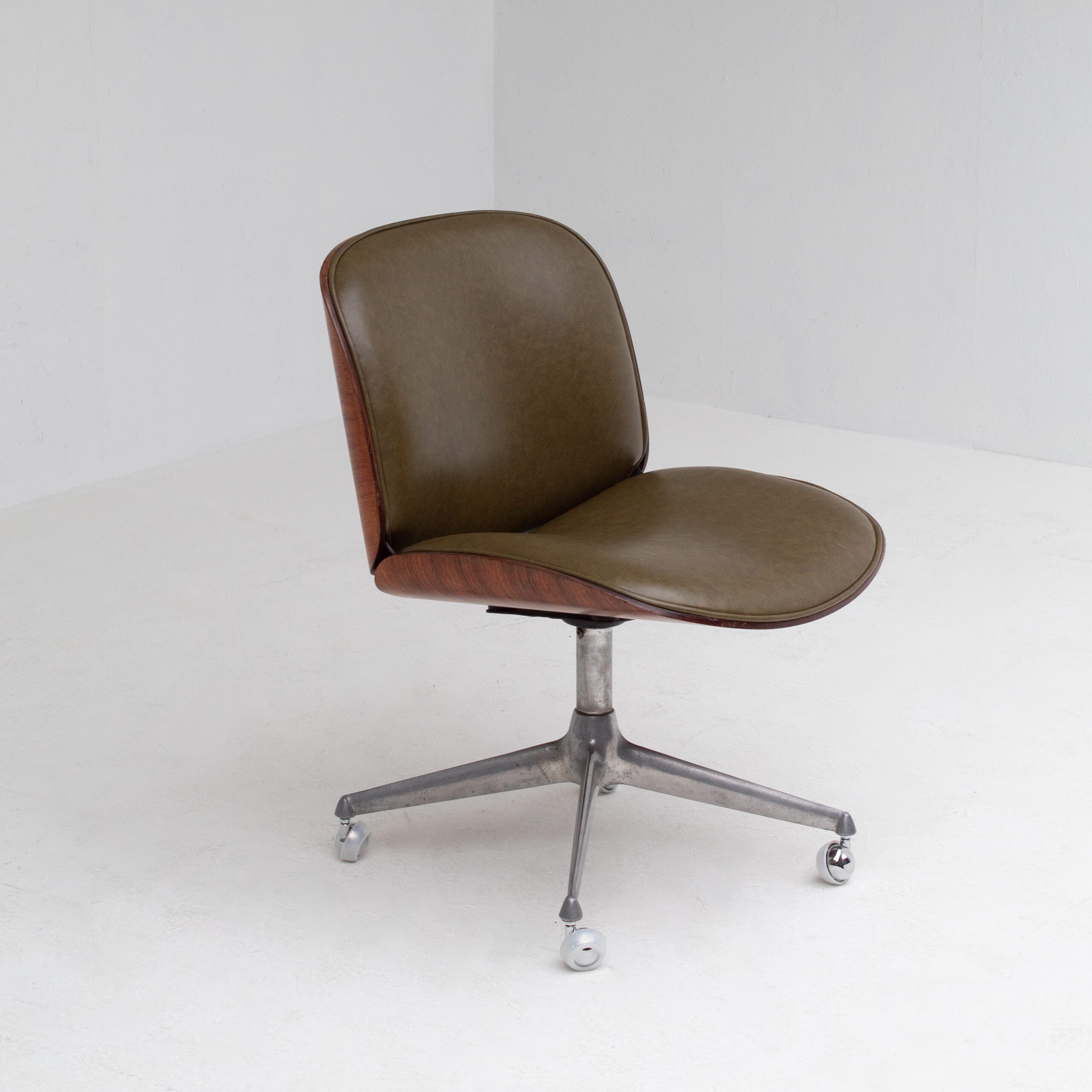 Ico Parisi Office Chair in Wood and Metal — angled view showing green leather seat