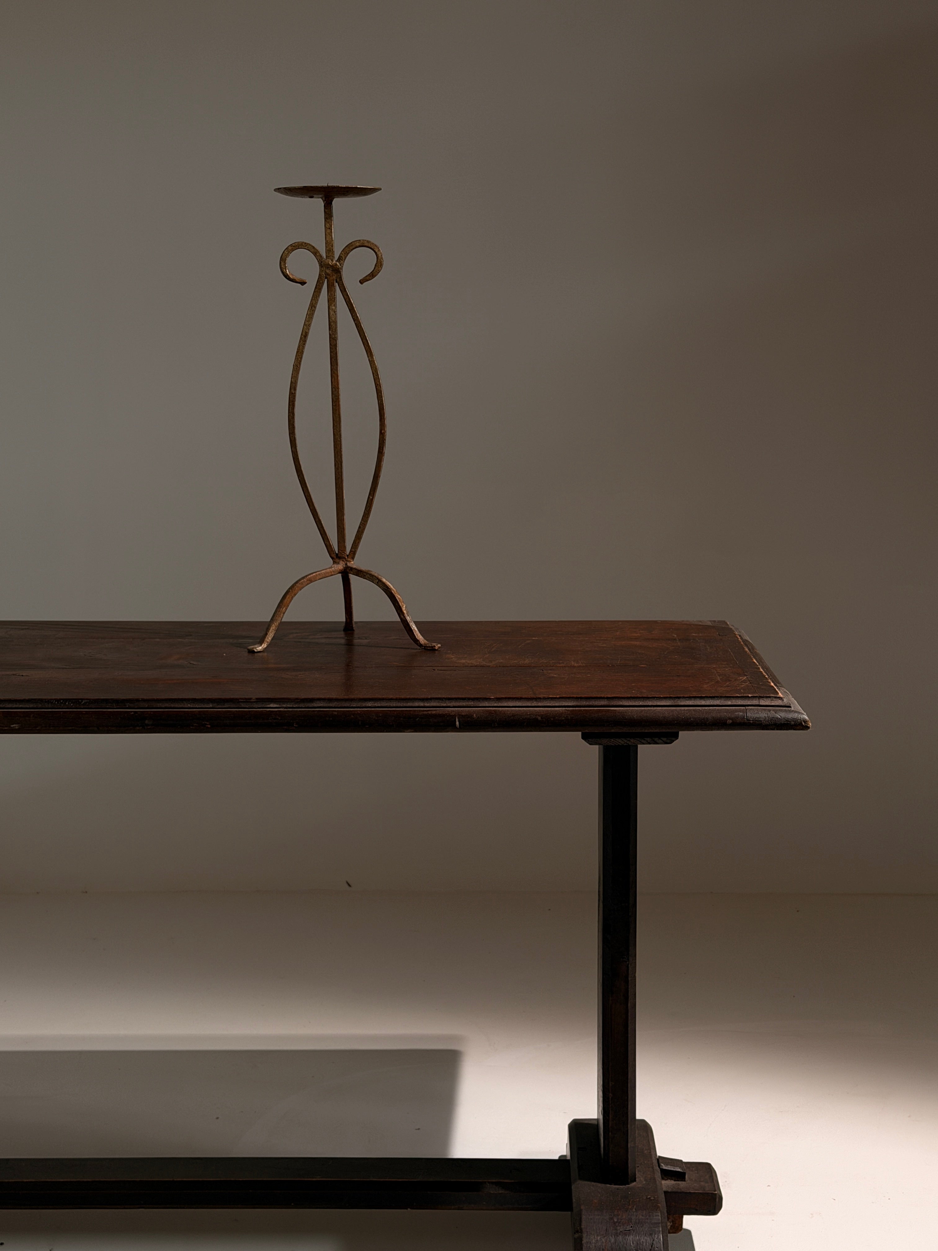 Large standing candlestick in gilt patinated metal, France, 1950.  — lifestyle setting