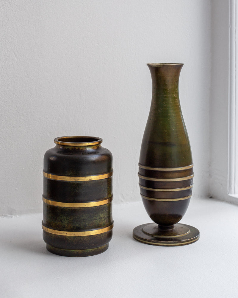 Modernist bronze brass vases with gold bands detail view