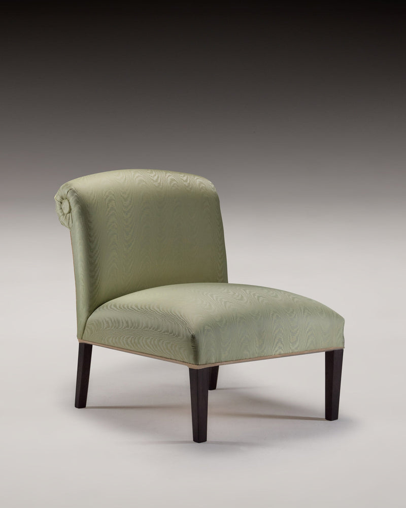 HESTIA SLIPPER CHAIR — close-up of green upholstered fabric texture