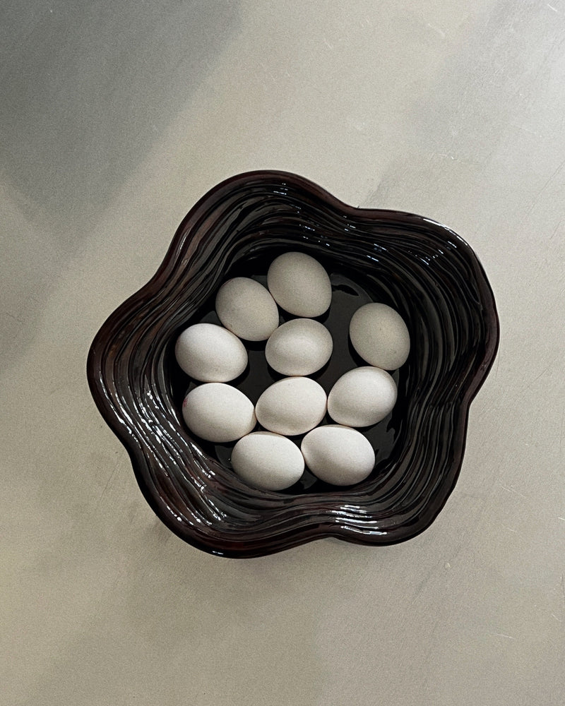 Handsculpted ceramic bowl in chocolate gloss finish with eggs