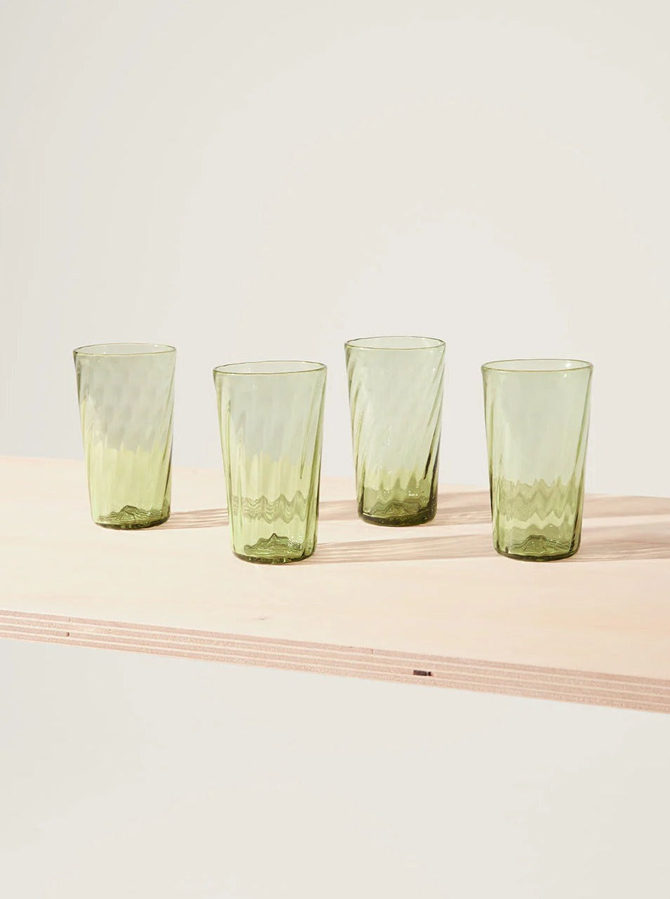Karl Glass Large - Set of Four — top view on light wood surface