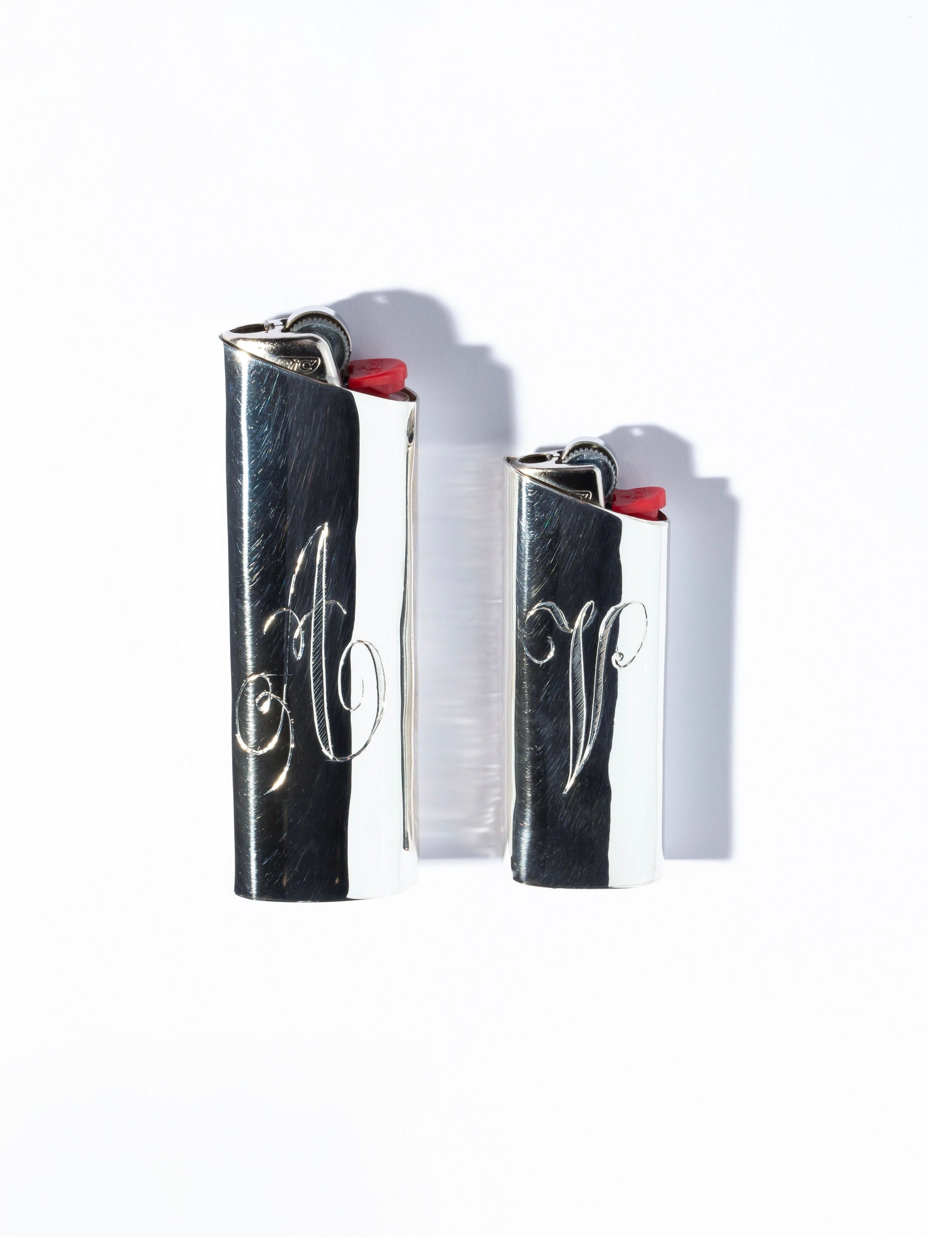 Monogram Lighter Case Small Size — side angle showing polished silver finish