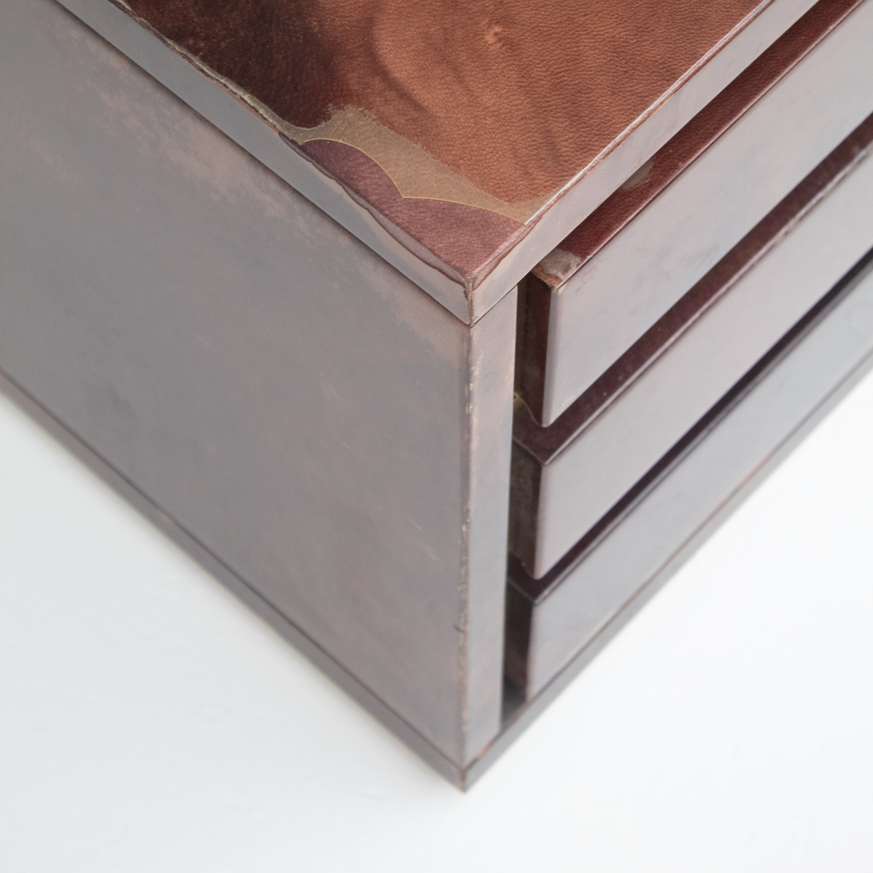 Pair of Aldo Tura (attr) Nightstands in Parchment and Brass — angled view highlighting brass drawer handles