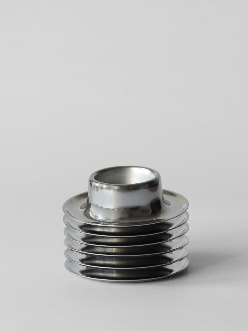 Stainless Steel WMF Egg Cups, Set Of 6, Germany, 1970s — close-up of stacked egg cups on gray background