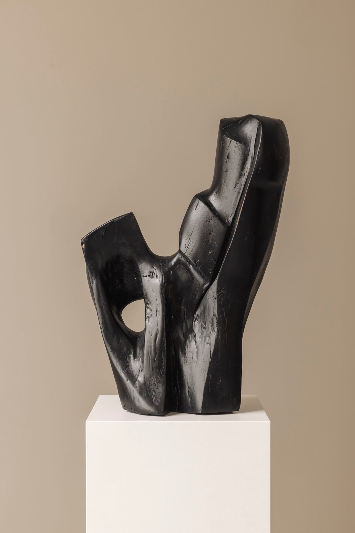 Abstract sculpture in solid dark stained wood dating from the 1950s. — additional view