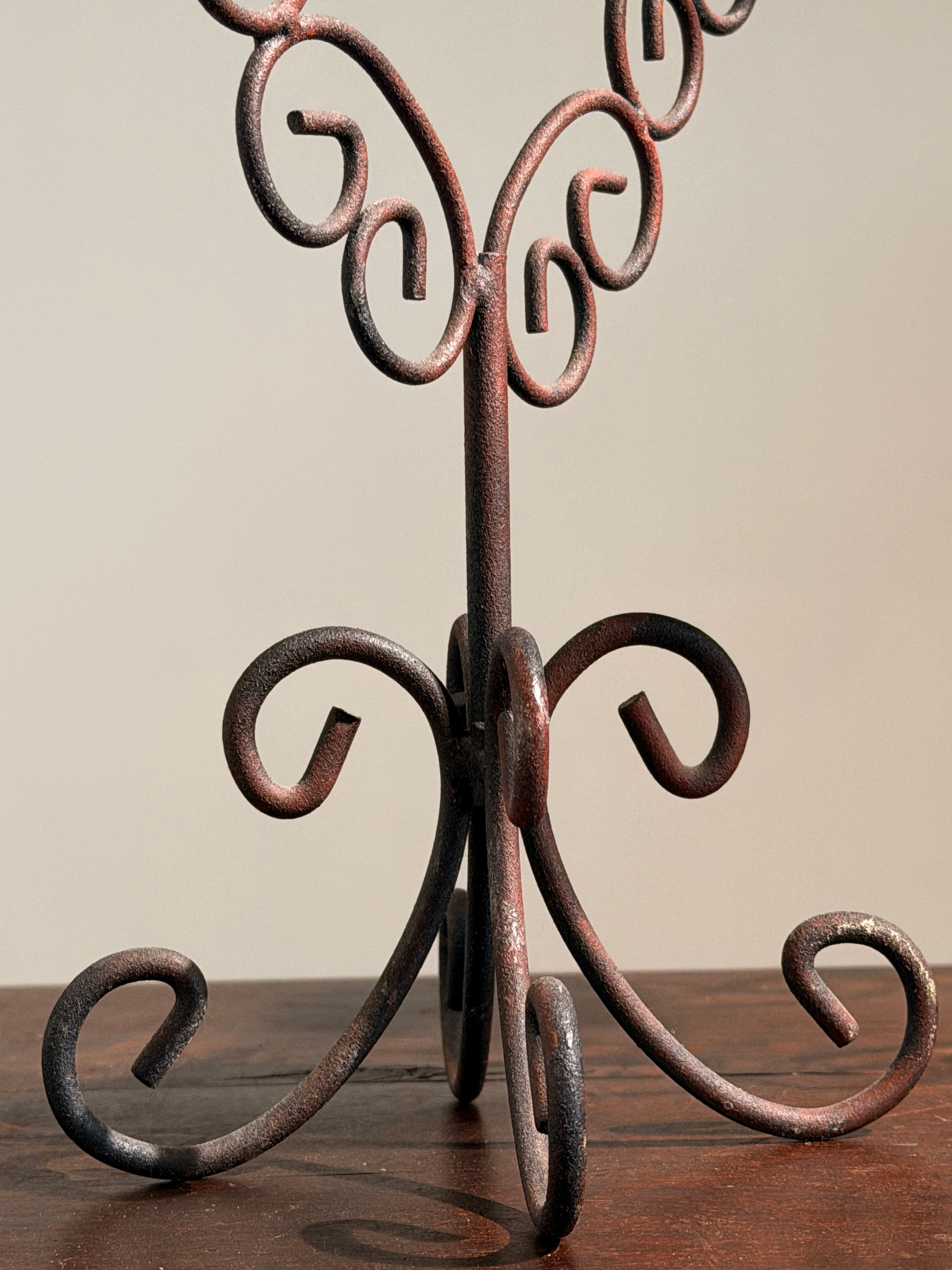 Pair of three-light wrought-iron candleholders, circa 1950 — alternate view