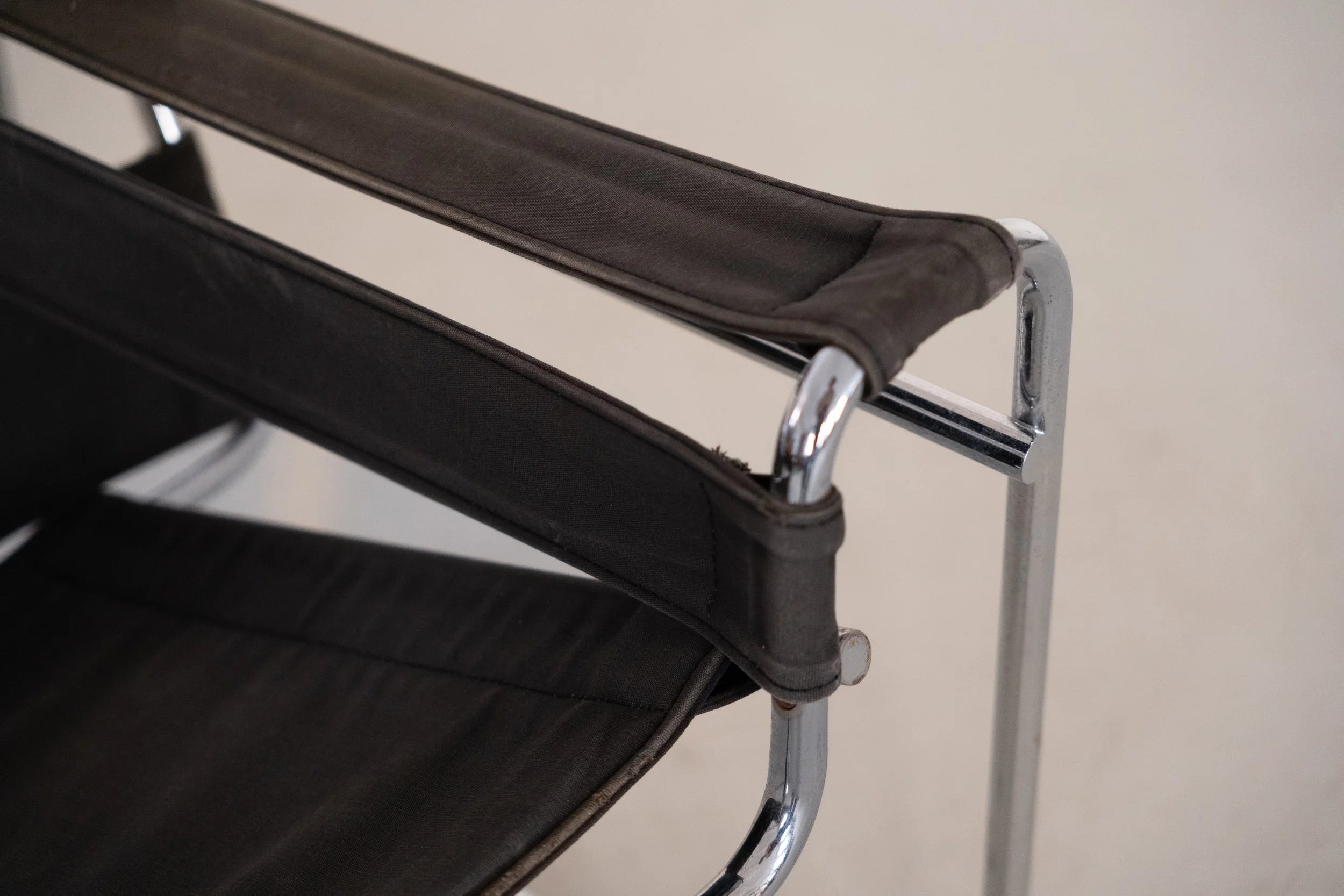 Wassily Chair by Marcel Breuer for Gavina — close-up of black canvas and chrome armrest