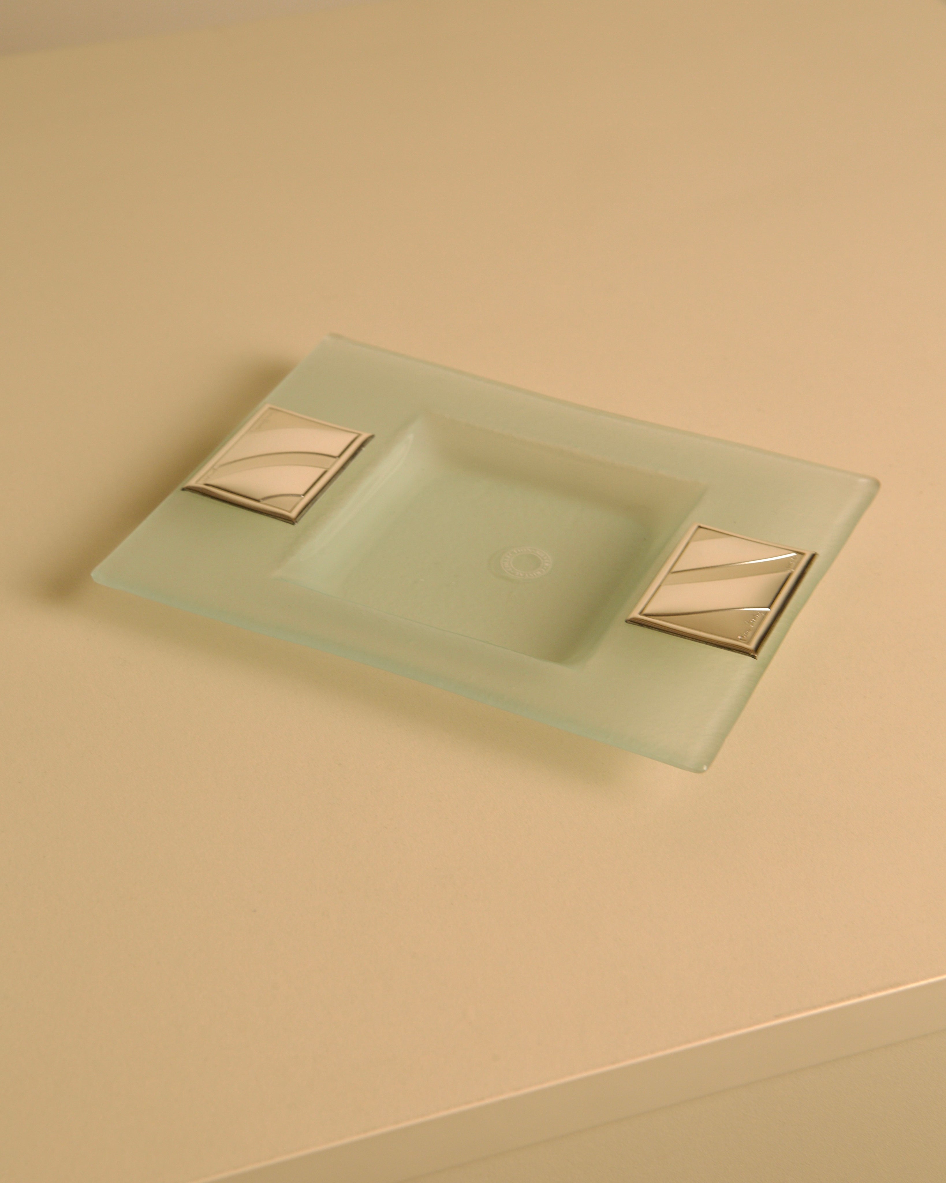 Rectangular crystal and silver-plated metal valet tray by Pierre Cardin, 1980s — top view on neutral surface