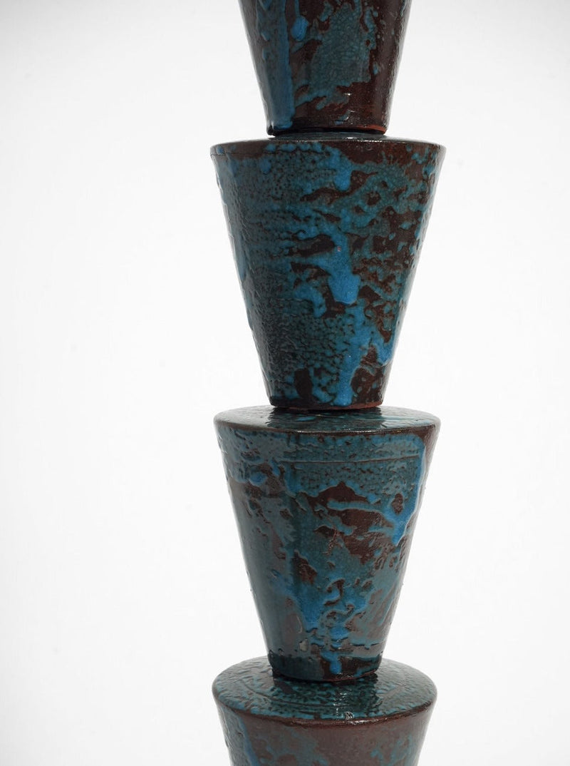 Nizwa" Floor Lamp — close-up of textured turquoise ceramic base