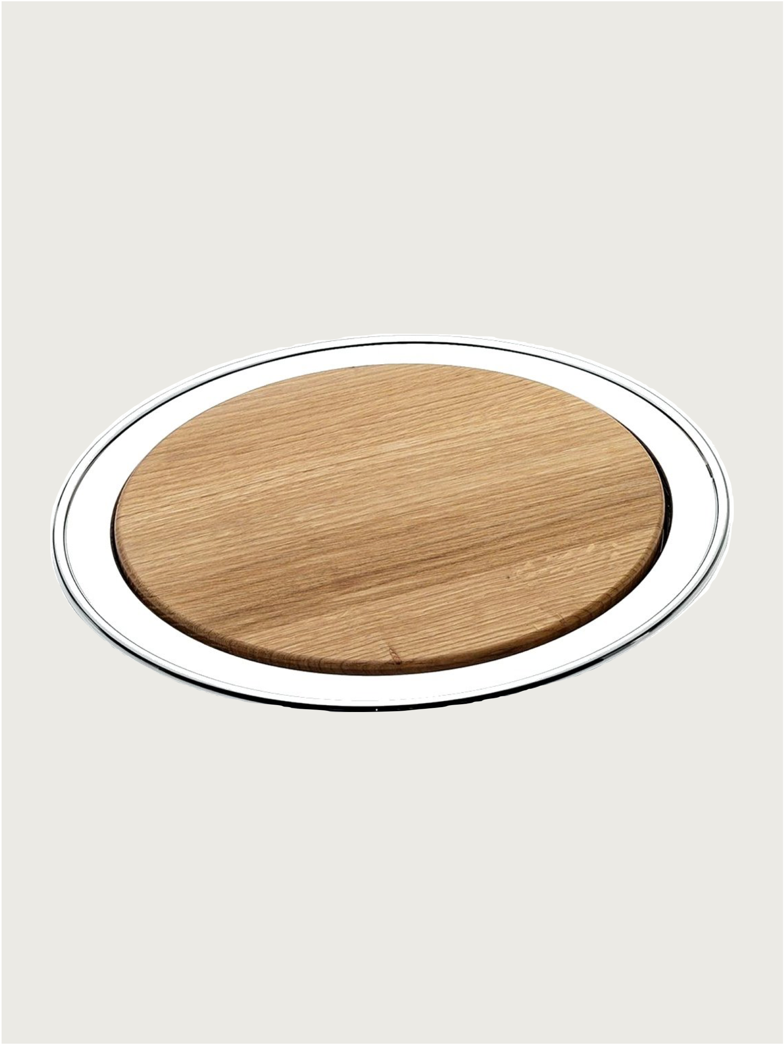 Silver-plated round cutting board by zanetto | The Oblist — wood and silver material