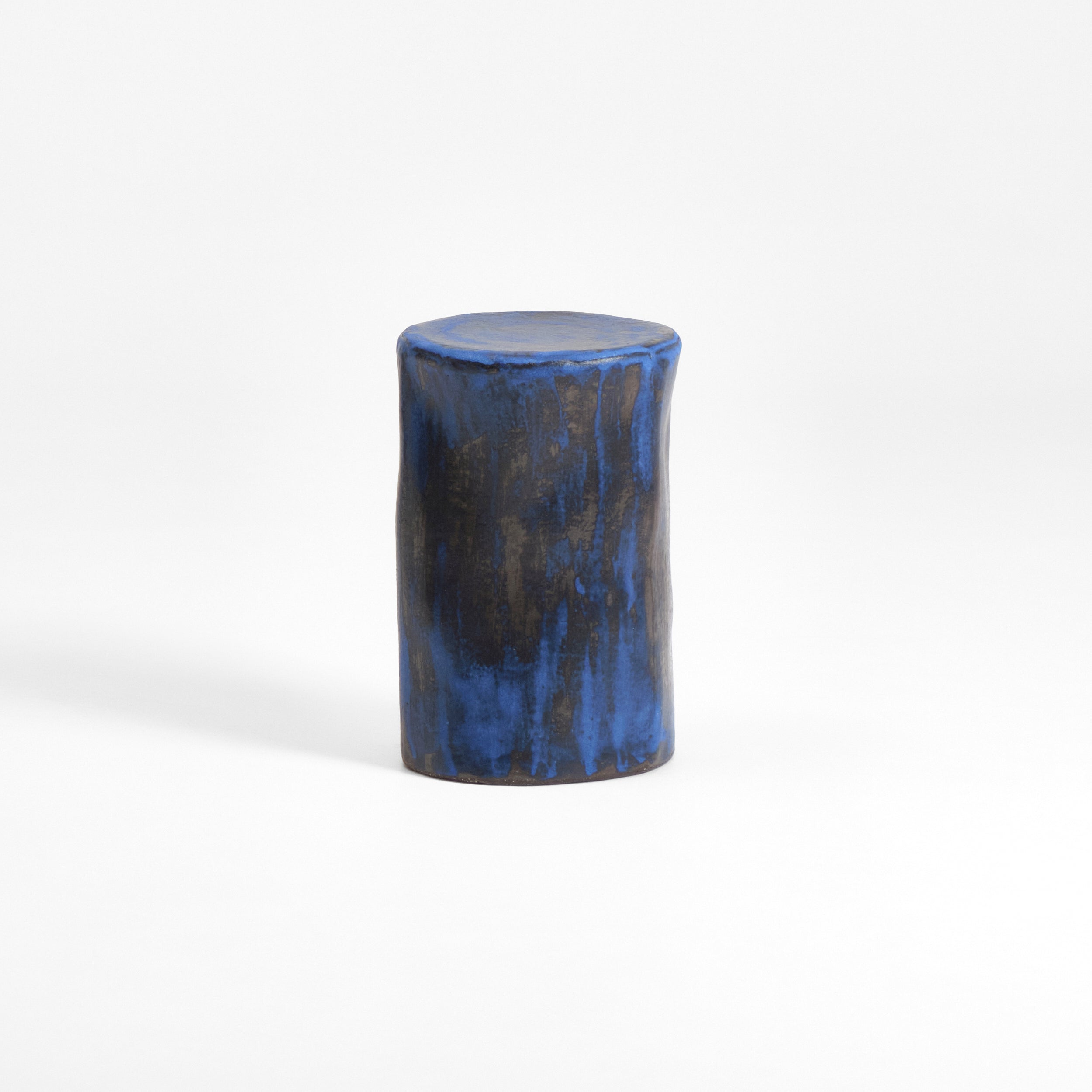 Small Ceramic Side Table — back view showing blue glaze finish