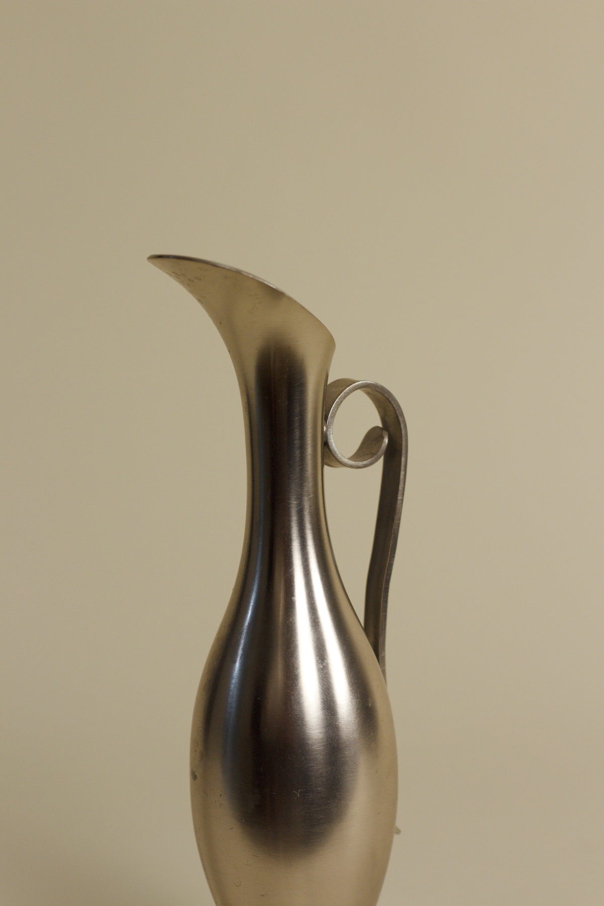 Sculptural Silver-Plated Pewter Pitcher — detail view