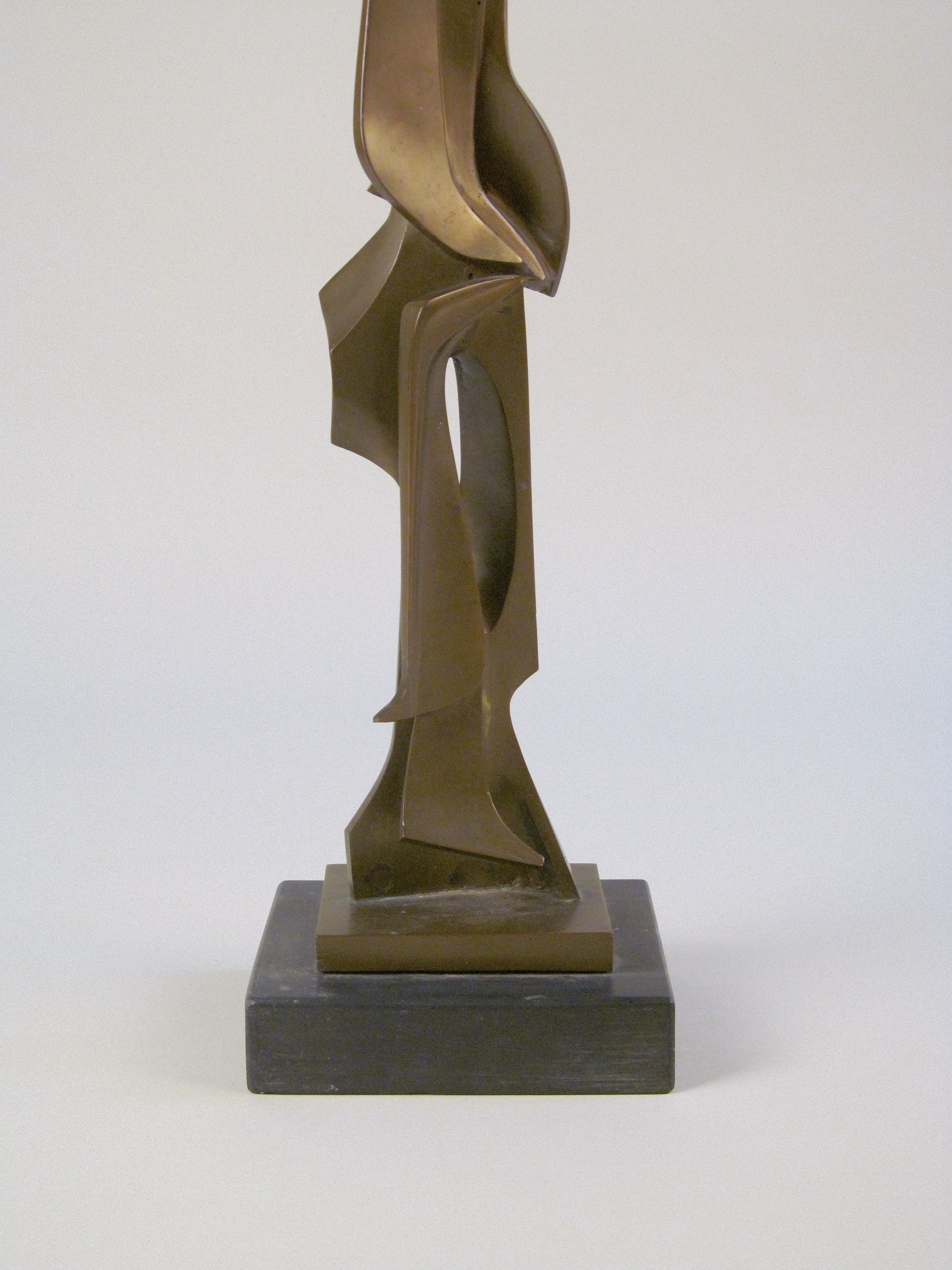 Abstract Bronze Sculpture — side angle showing geometric forms on black base