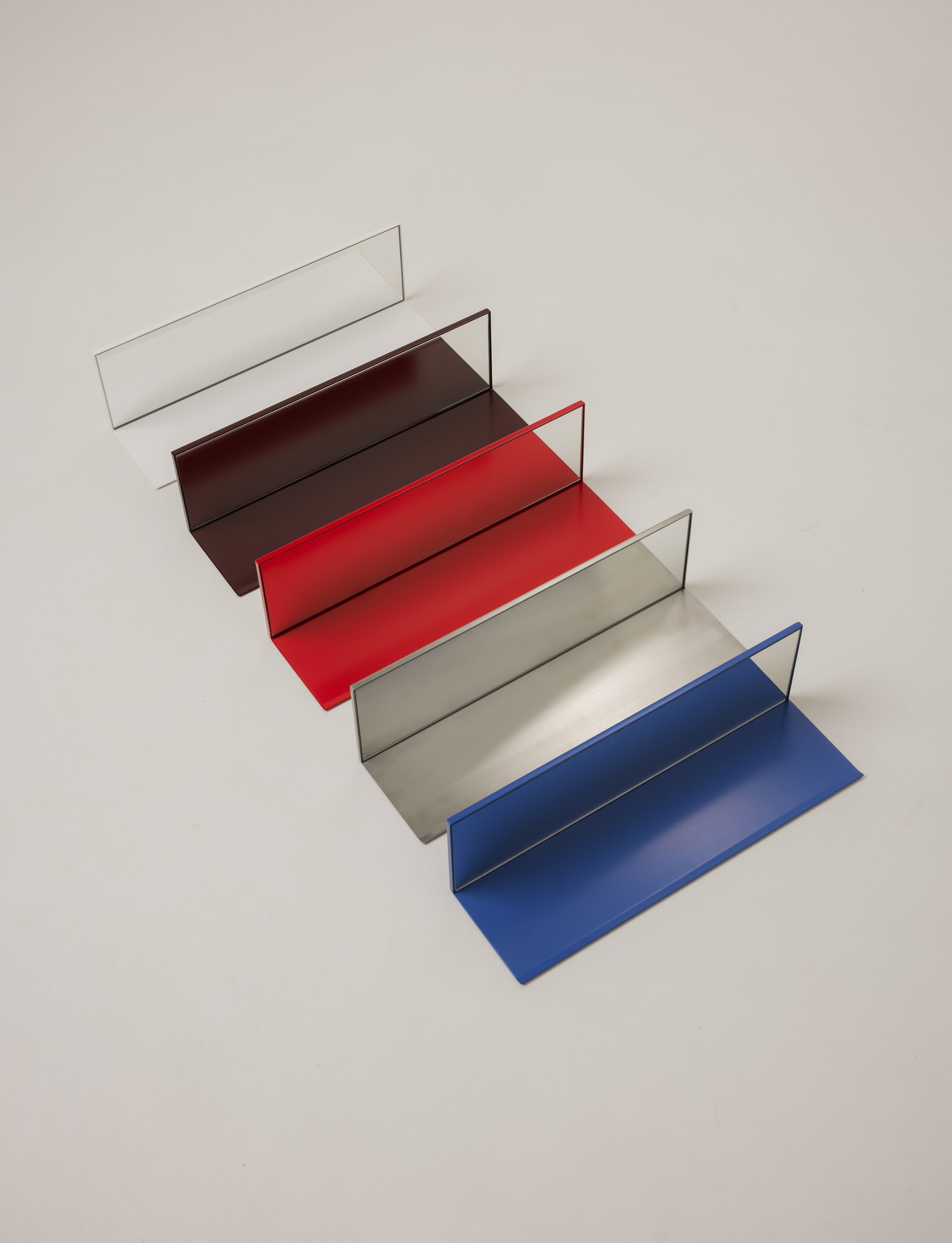 Mirror Steel Shelf — back view showing colored metal panels