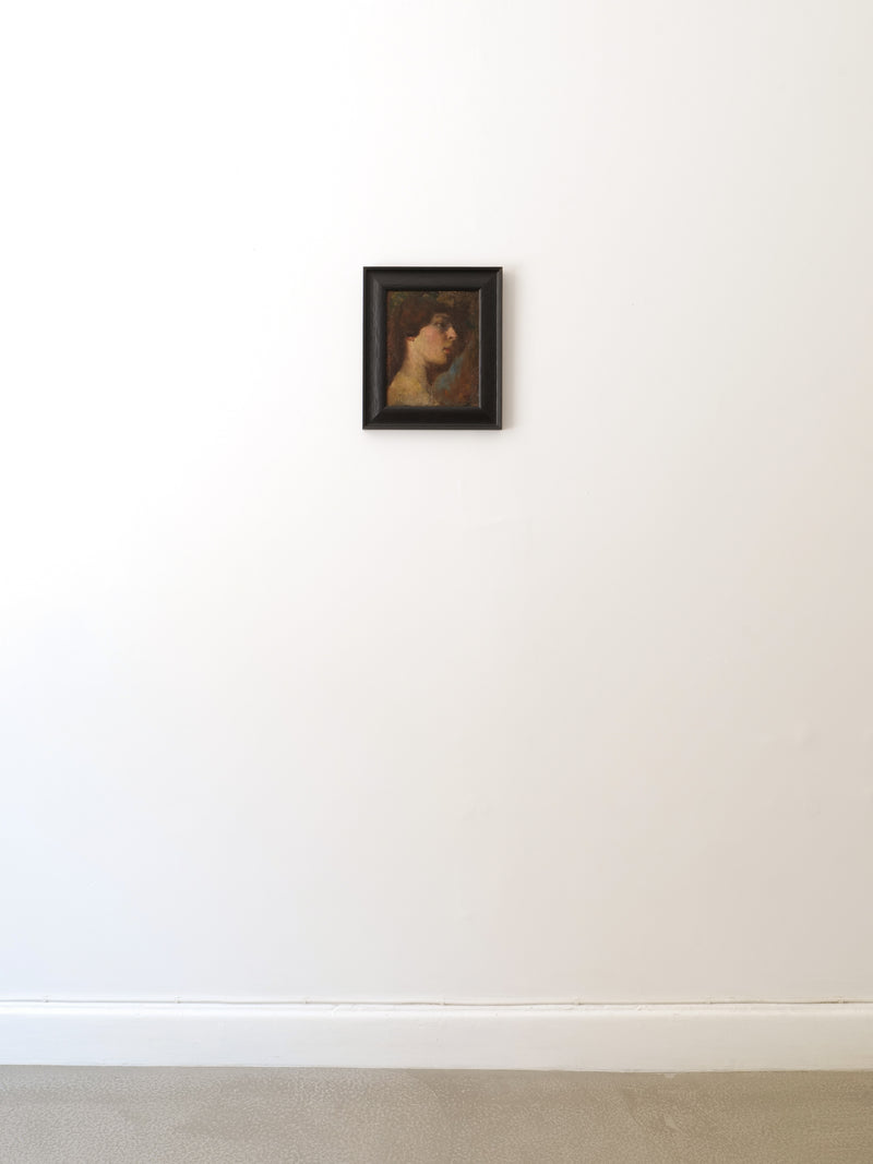 Victorian oil portrait painting in dark frame on white wall