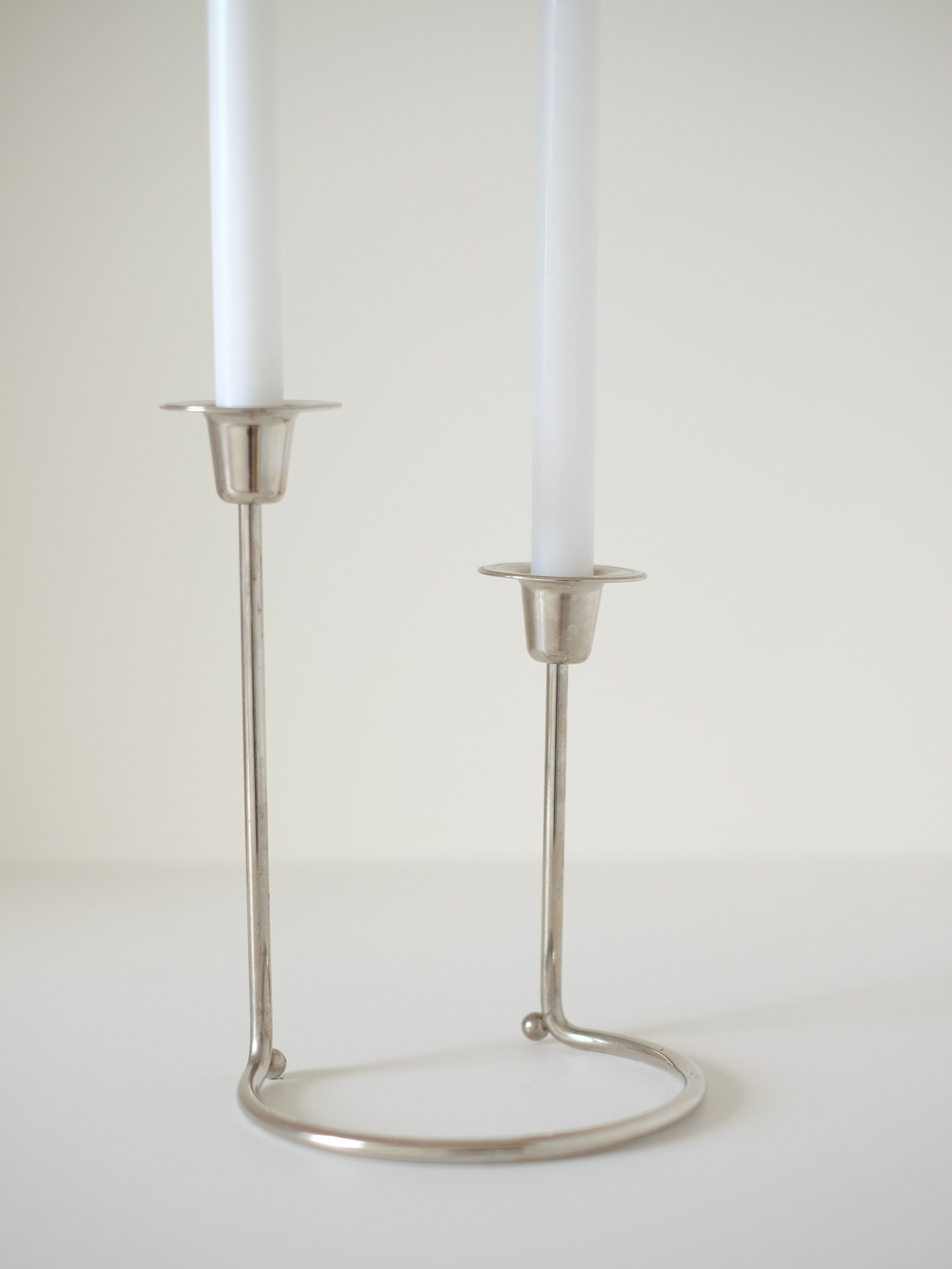 WMF Candle Holder — close-up of polished metal with two candle slots