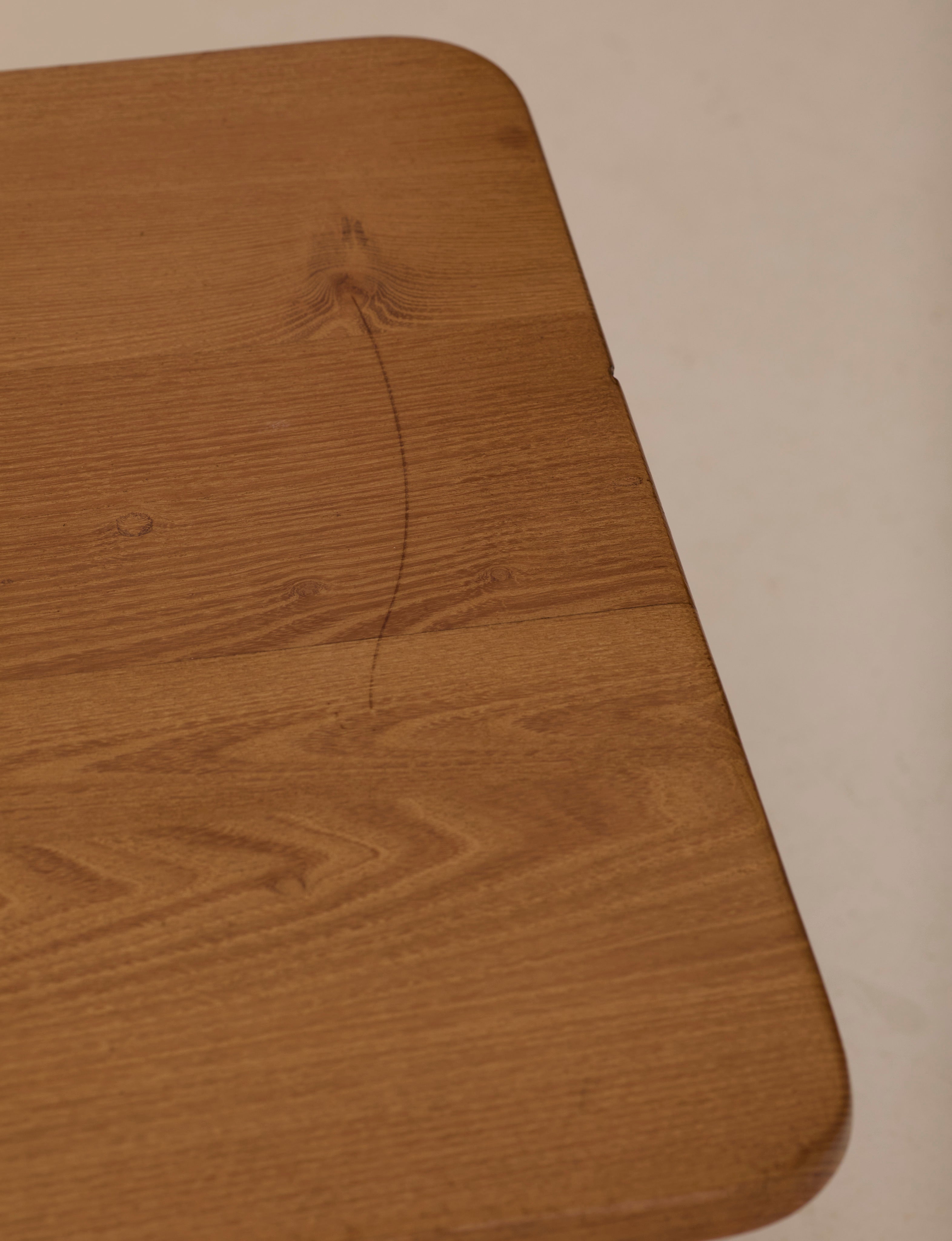 Solid elm coffee table by Alain Gaubert, France circa 1980 — close-up of wooden surface showing grain detail