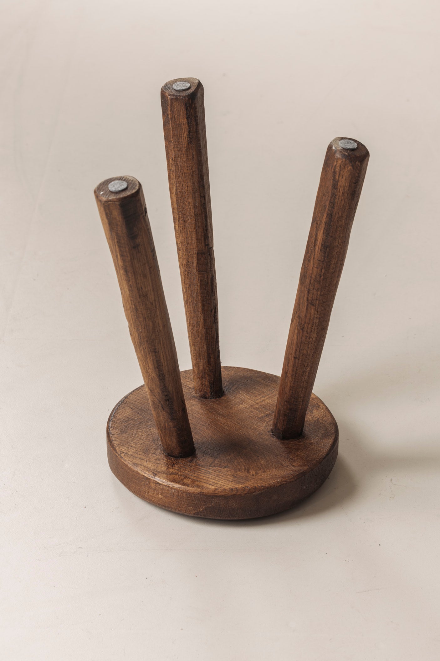 Set of two solid elm tripod stools from France, 1950s — in context