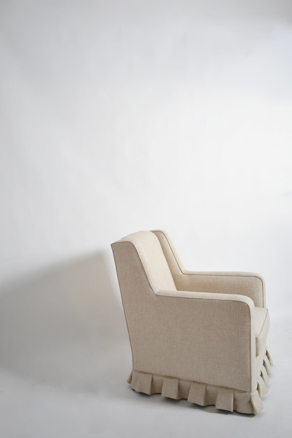 Pair of off white fringe armchairs, 1940s — side angle