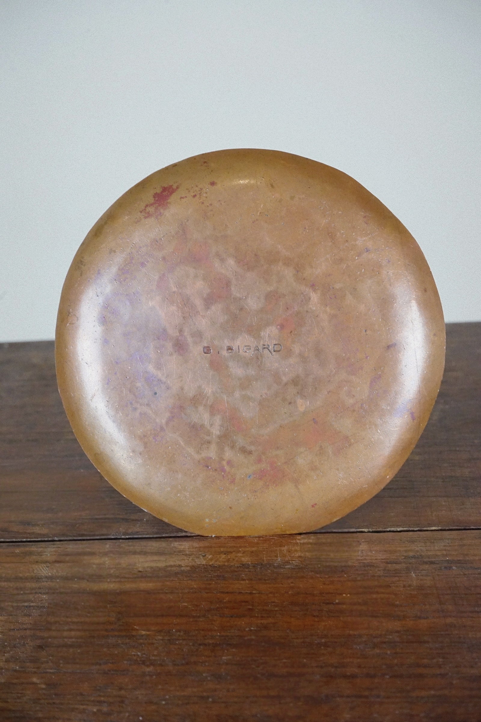 Hammered Dinanderie Dish — Gaston Bigard France, c.1920s — underside view showing brass patina and maker's mark