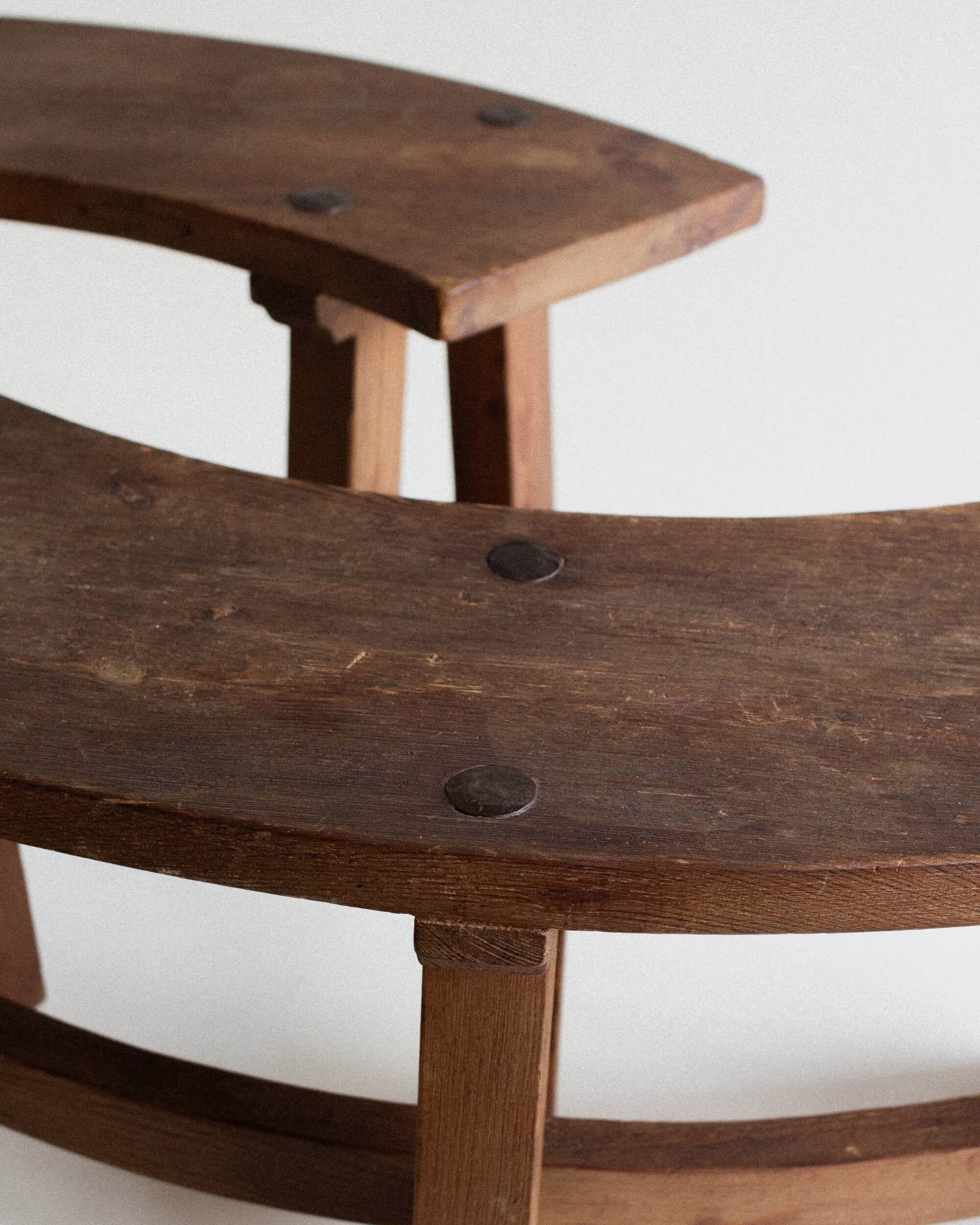French Brutalist Curved Benches — side angle