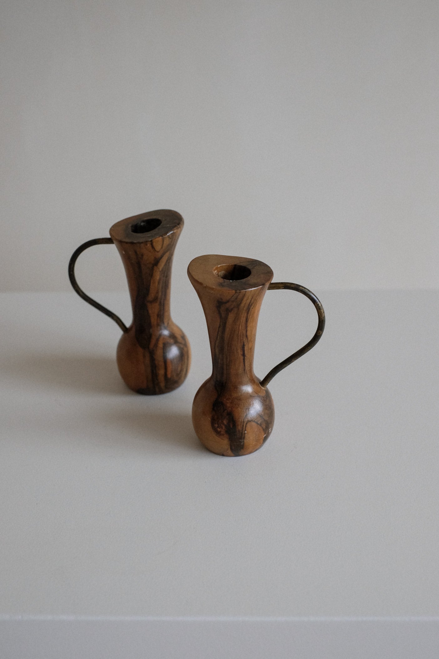 Pair of Wooden Candle Holders — top view on neutral surface